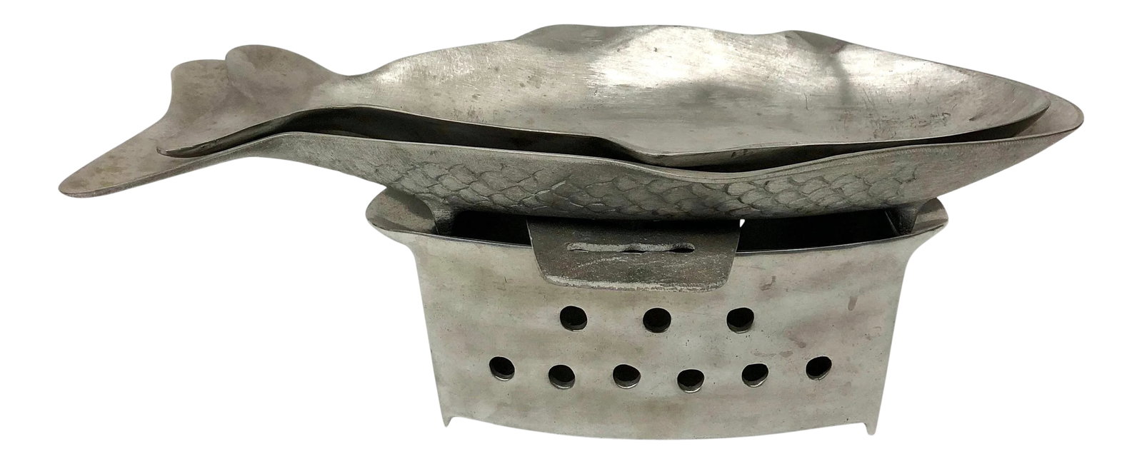 Vintage Metal Fish Warming Dishes - Set of 4: Totally unique set which was purchased in Thailand over 20 years ago. Never used but greatly admired. Simply place your whole fish on either the large or small platter and keep warm with votive