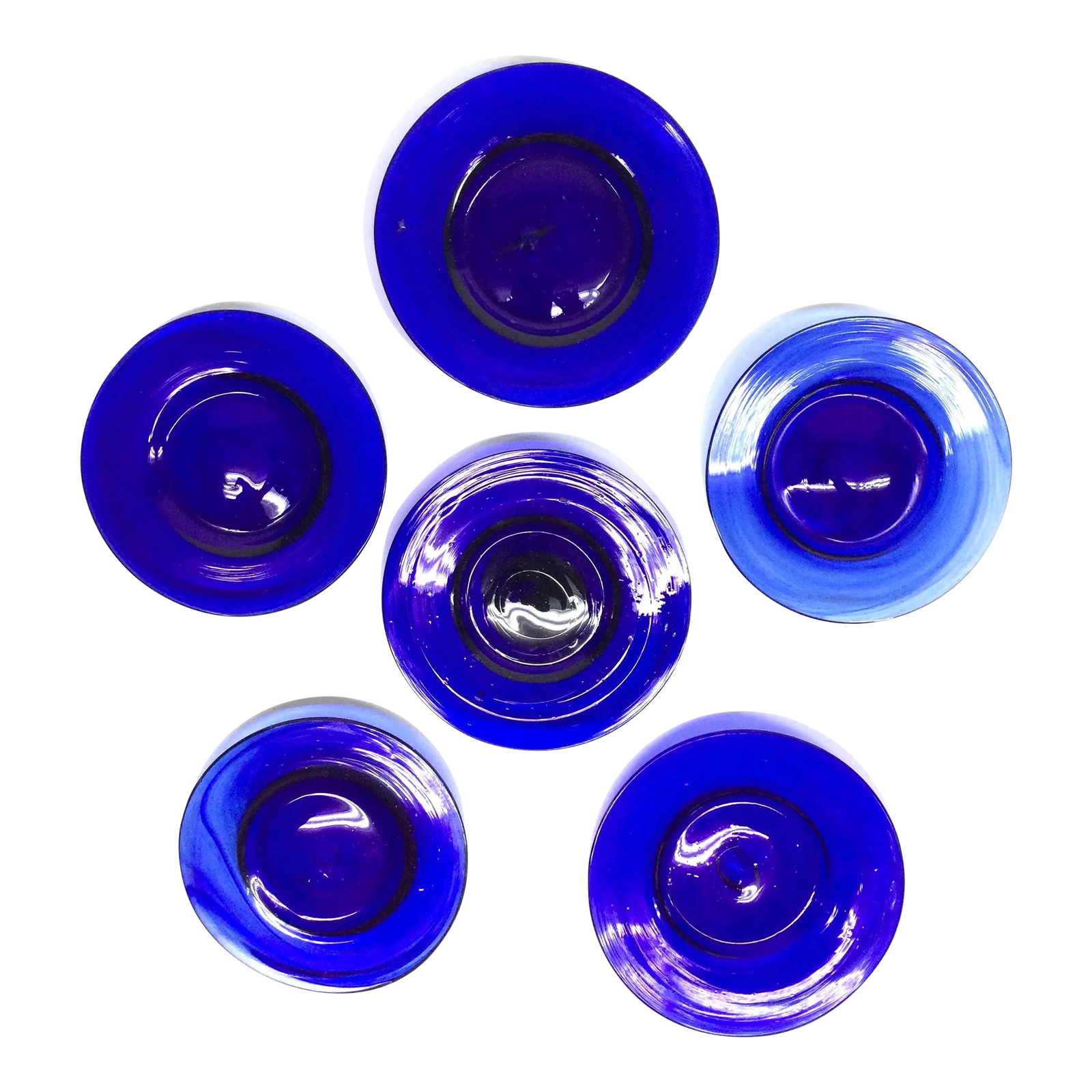 Hand Blown Art Glass Cobalt Blue Butter Plates Set of 6: Beautiful artisan cobalt blue at its best. This vintage set is a lovely way to add color and style to any table. These versatile plates can be used as a saucer, a coaster, a candle holder, anything