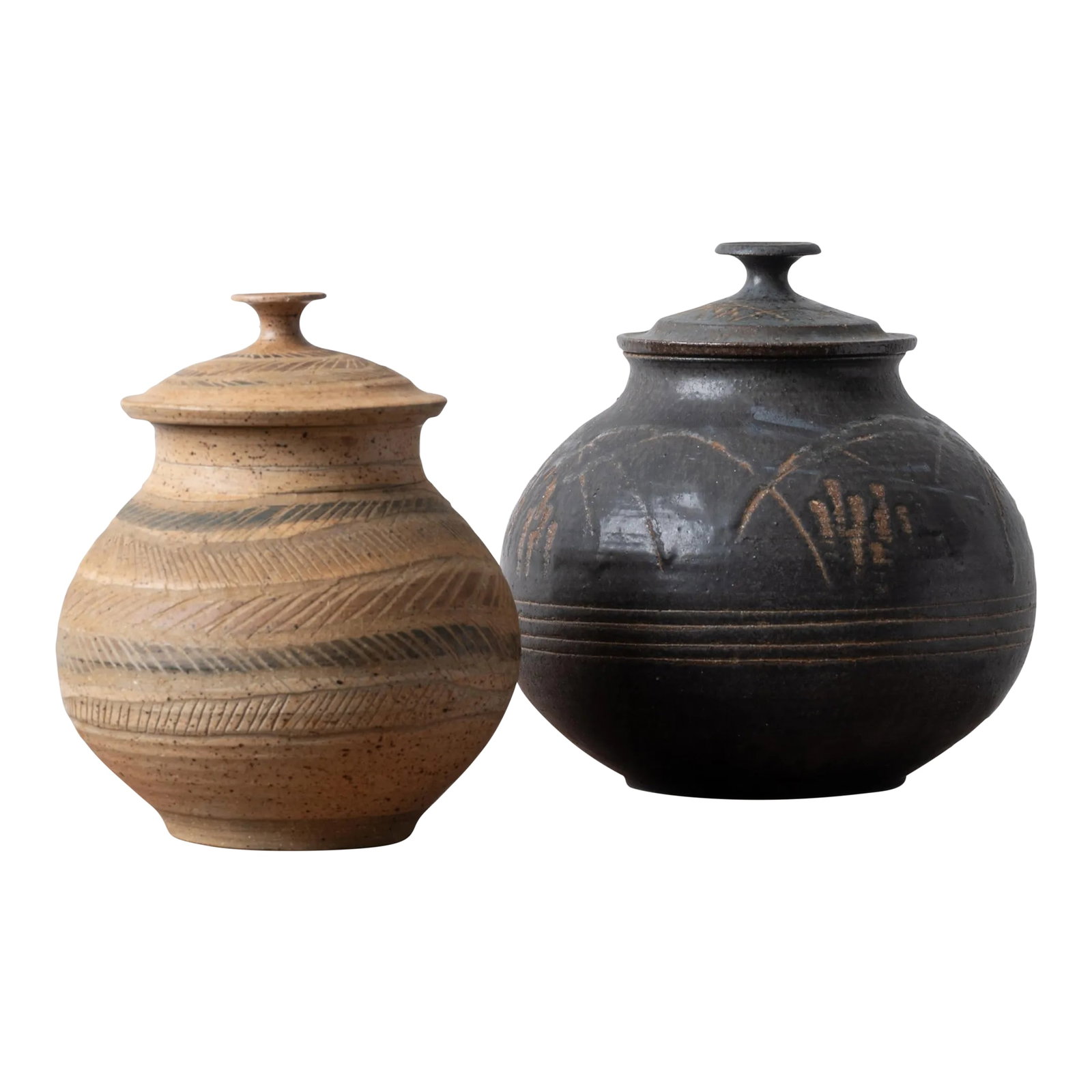 Charles Counts Pottery Lidded Jars - a Pair: Charles Counts (American, 1934-2000) A pair of lidded jars, c.1960 larger: 10 by 10 inches smaller: 8 by 9 inches Condition: Alterations: Original Condition Unaltered Imperfections: Some Imperfections
