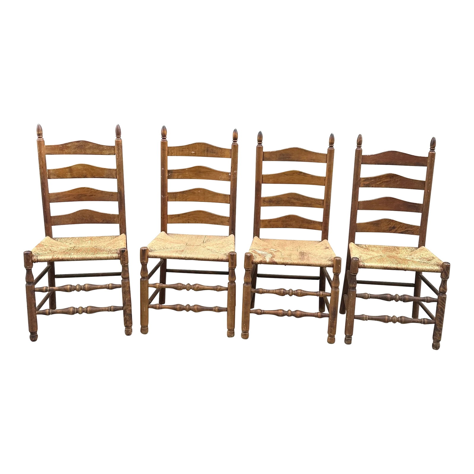1970s Collection of Wood and Wicker Ladder Back Chairs- Set of 4: Up for consideration is a beautiful collection of four wood and wicker ladder back chairs. These would look lovely in your home and they are a great find for the interior design enthusiast. Please che