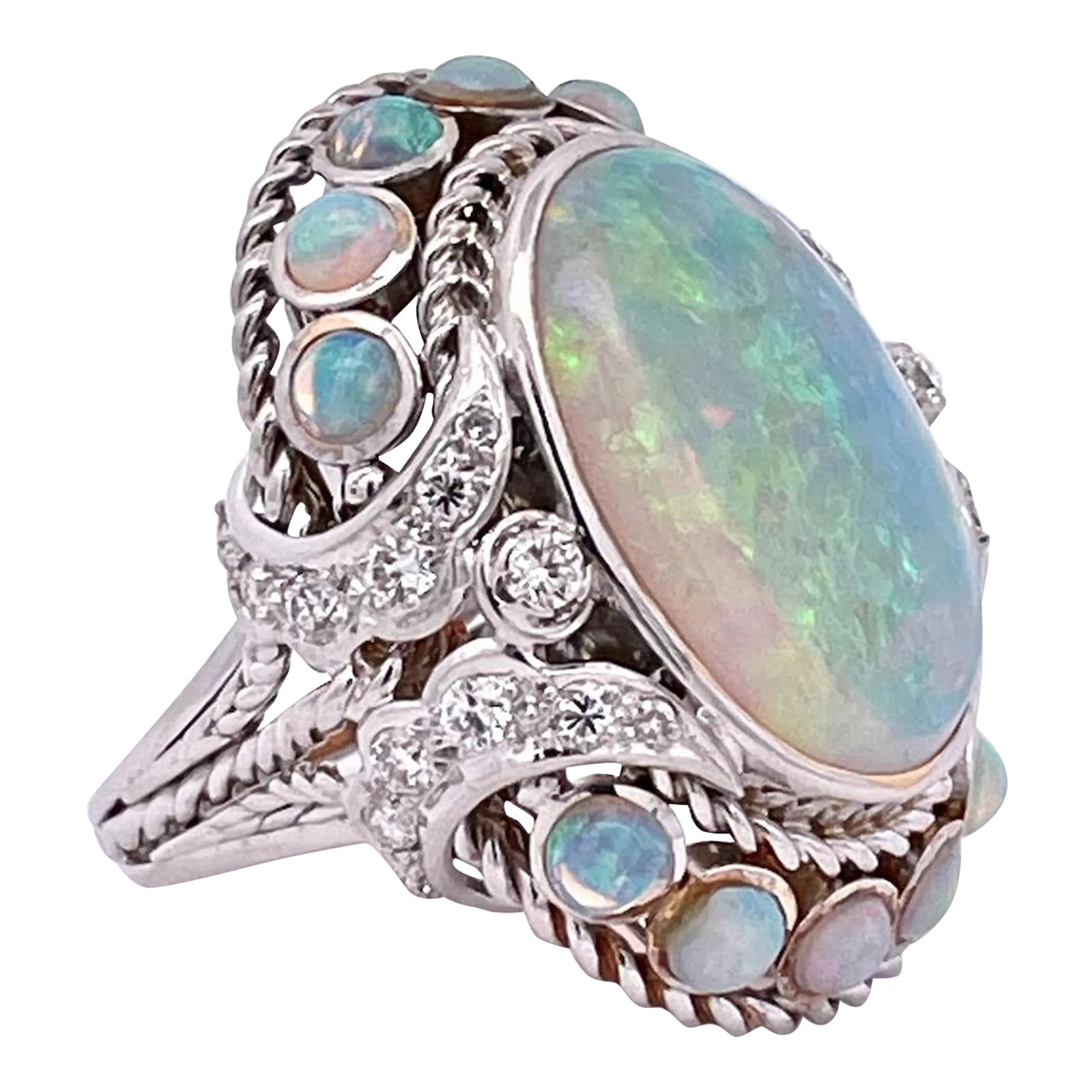 Large Opal Diamond Ring 18k 6.75: This is part of Chairish's Fine Jewelry assortment. This Opal Ring is huge it measures 35mm x 30mm and has beautiful matrix of Blue, Pink, and Yellow. This cocktail ring has an Opal of 19.82 x 14.82
