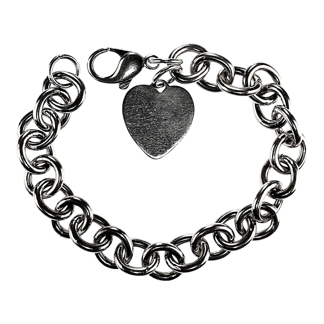 Late 20th Century Sterling Silver Link Bracelet With Heart: This is part of Chairish's Costume Jewelry assortment. Elegant Sterling Silver Link Bracelet with Heart - Perfect for Engraving This sterling silver link bracelet with heart is a timeless piece that
