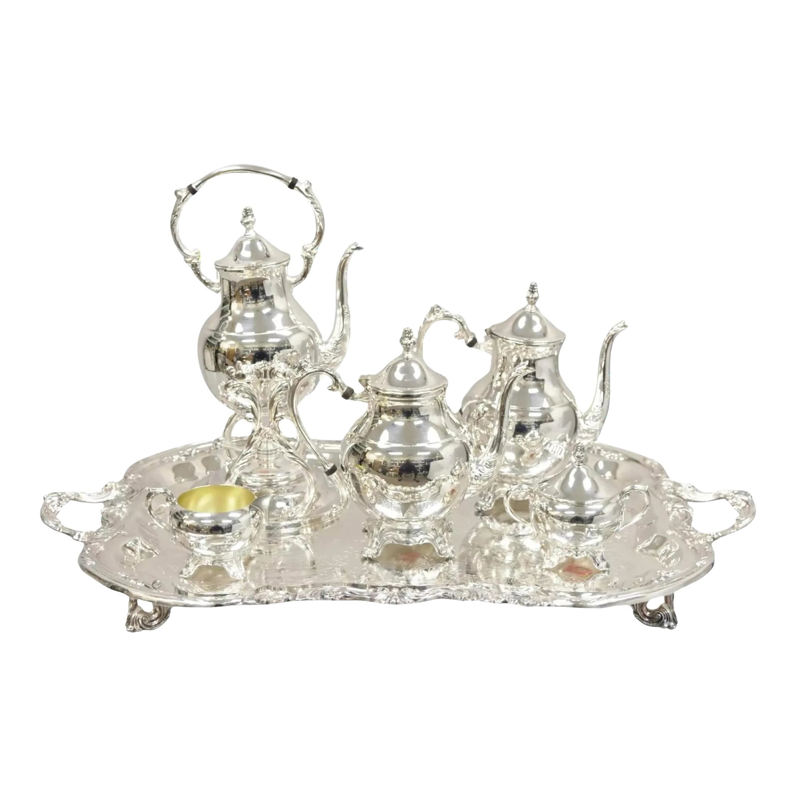 Vintage Fb Rogers Victorian Silver Plated Tea Set With Tilting Pot Set- 6 Pieces: Vintage FB Rogers Victorian Style Silver Plated Tea Set with Tilting Pot - 6 Pc Set. Circa Mid to Late 20th Century. Measurements: Tray: 2.5" H x 29" W x 18" D Tilting Tea Pot: 14.5" H x 6.5" W x 7"