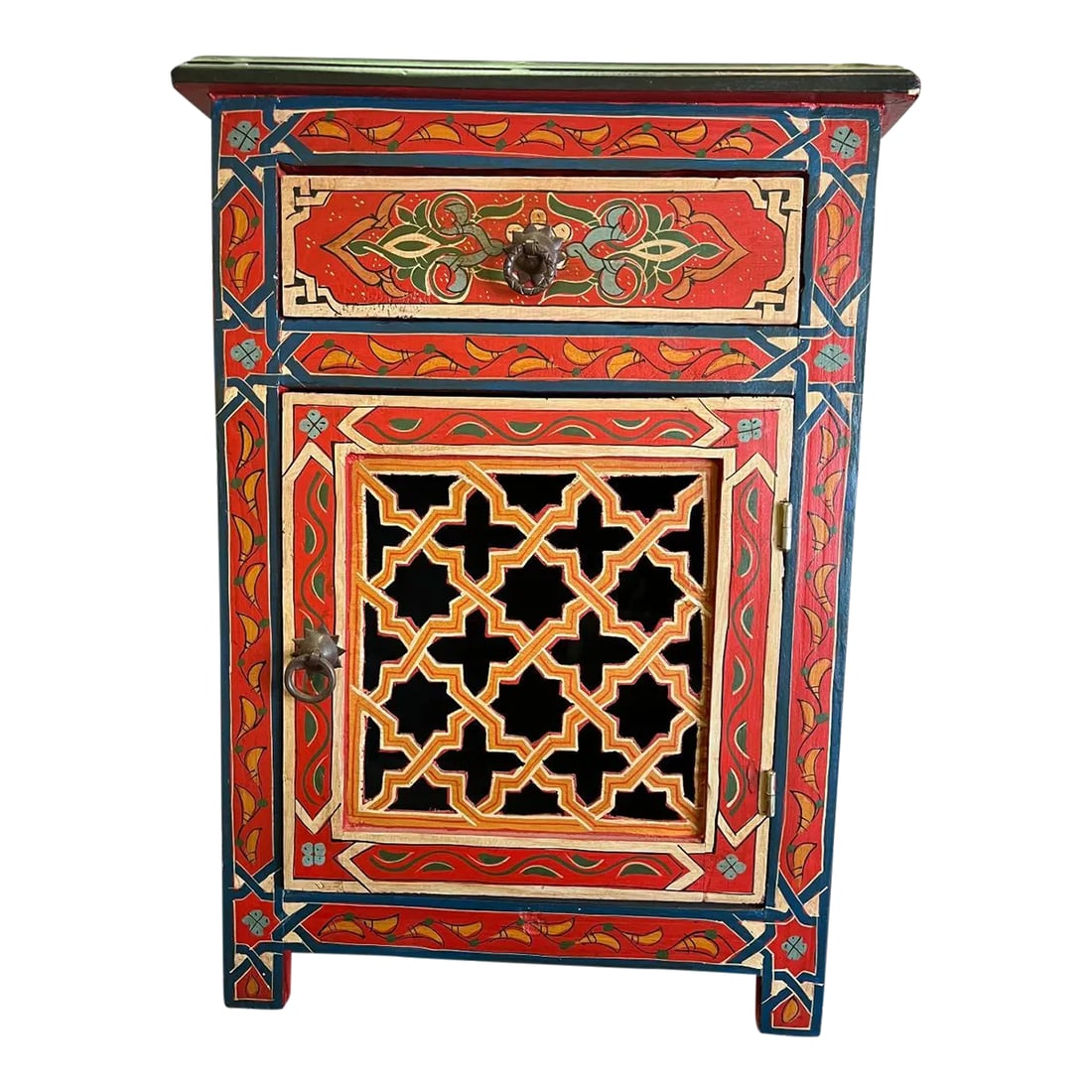 Small Painted Cabinet With Bright Colors: Painted red cabinet with multi designs and bright painted colors with a pierced door. Possibly Moroccan. Condition: Alterations: Original Condition Unaltered Imperfections: Some Imperfections Conditio