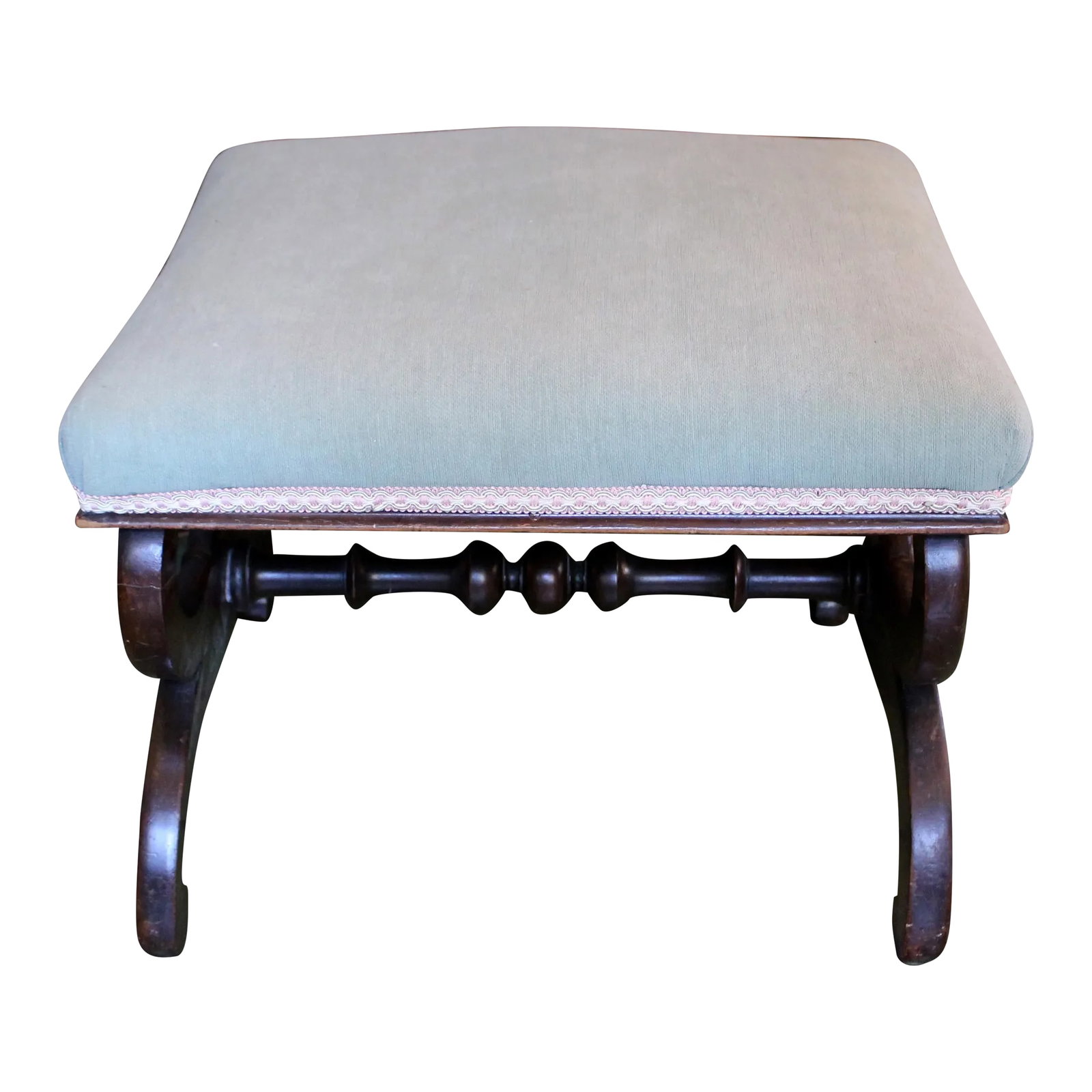 C. 1835 English William IV Ottoman or Bench: Circa 1835 curule form William IV ottoman or bench, English. Carved mahogany. A shield is carved at the center of the leg with whorls at the ends of each scrolled section. Well turned cross stretcher.