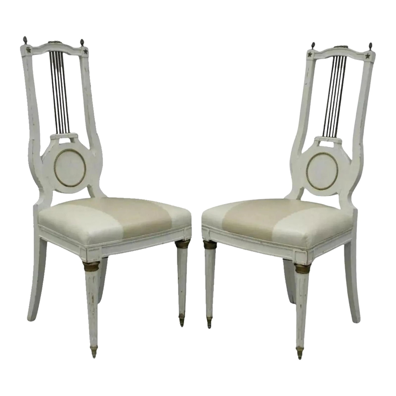 Early 20th Century Antique French Empire Neoclassical Style Brass Harp Lyre Side Chairs - a Pair: Antique French Empire Neoclassical Style Brass Harp / Lyre Back Side Chairs - a Pair. Item features solid wood construction, harp backs, finely cast brass or bronze mounts, white distress painted fini