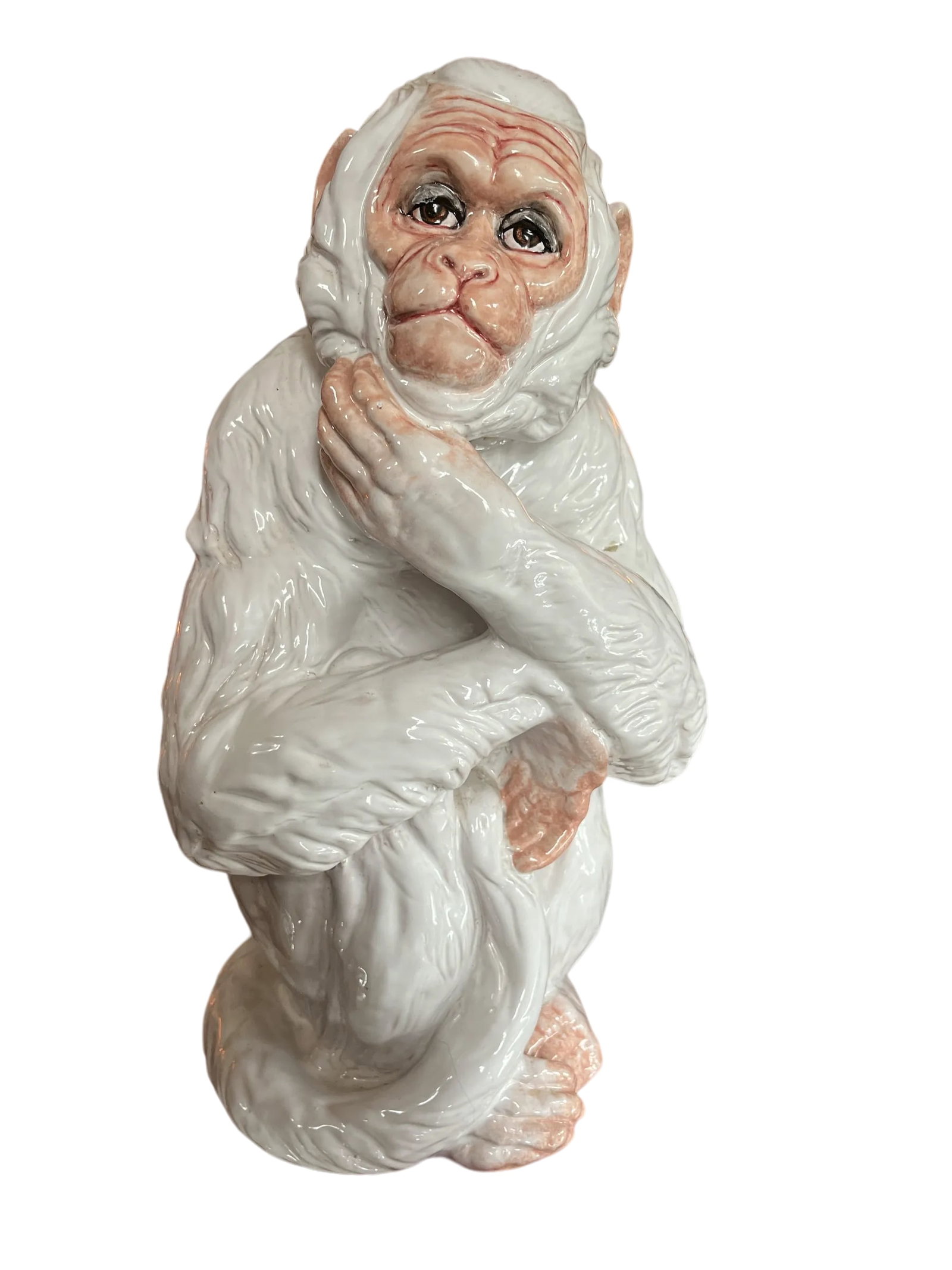 Large 1960s Italian Faenza Barbotine Ceramic Statue of a White Majolica Capuchin Monkey: At fifteen and a half inches, this 1960s Italy seated white capuchin monkey makes a tastefully whimsical in rooms that range from tropical, Palm Beach Regency to traditional blue and white Chinoiserie