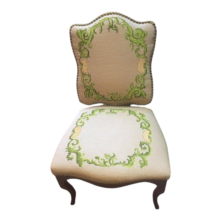 Early 1800s Regency Walnut Side Chair Side Chair With Needlepoint Upholstery: This lovely Regency period side chair features a shield back and serpentine front and legs. The seat and back are nicely upholstered in needlepoint with a whimsical chrysanthemum pattern and the shiel