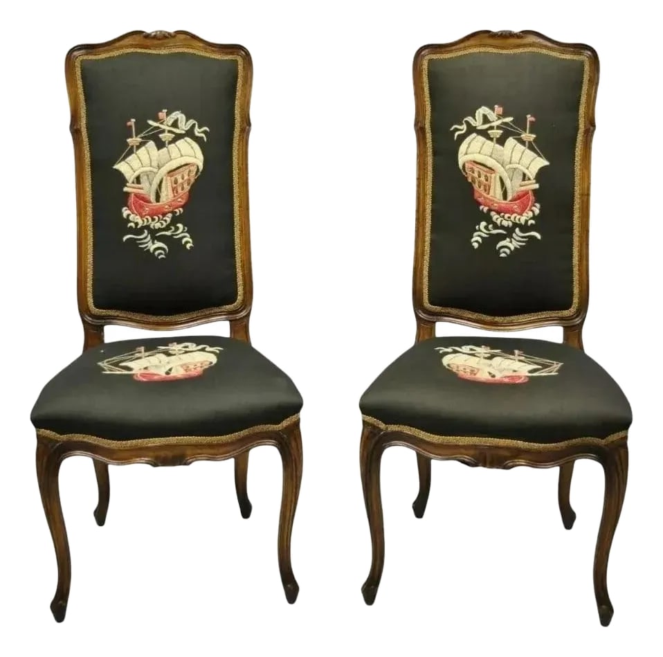 Early 20th Century French Provincial Louis XV Walnut Side Chairs With Ship Boat Crewel Work - A Pair: Vintage French Provincial Louis XV Style Walnut Side Chairs with Ship Boat Crewel Work - a Pair. "Crunchiness" to padding of backrests. Circa Early 20th Century. Measurements: 45" H x 20" W x 24" D x