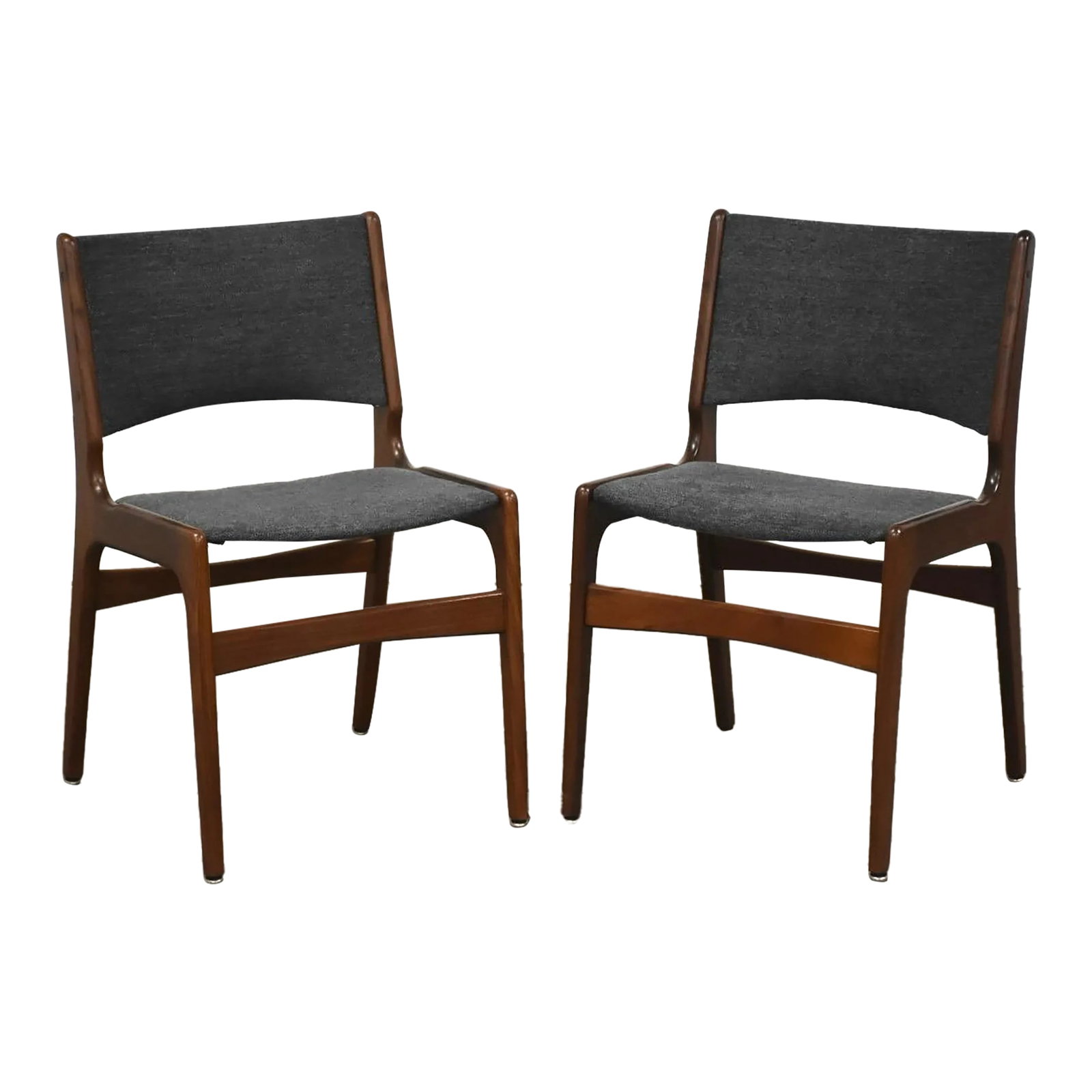 1960s Erik Buch Dining Chairs - a Pair: A pair of mid century modern teak dining chairs with new dark grey fabric by Erik Buch. Professionally refinished. Made in Denmark. Seat height is 18". 19" wide. 20.5" deep. 31.5" tall. Condition: Alt