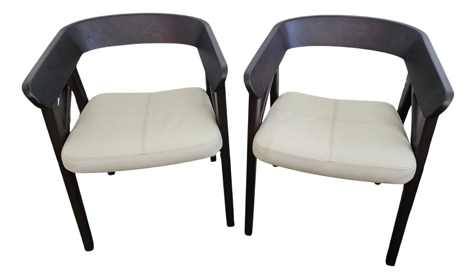 Pair of Chairs by Adriana Hoyos: Gorgeous pair of designer chairs by Adriana Hoyos in modern style, combine high- quality cream- colored leather covered seats with dark brown eye catching frame. Condition: Alterations: Original