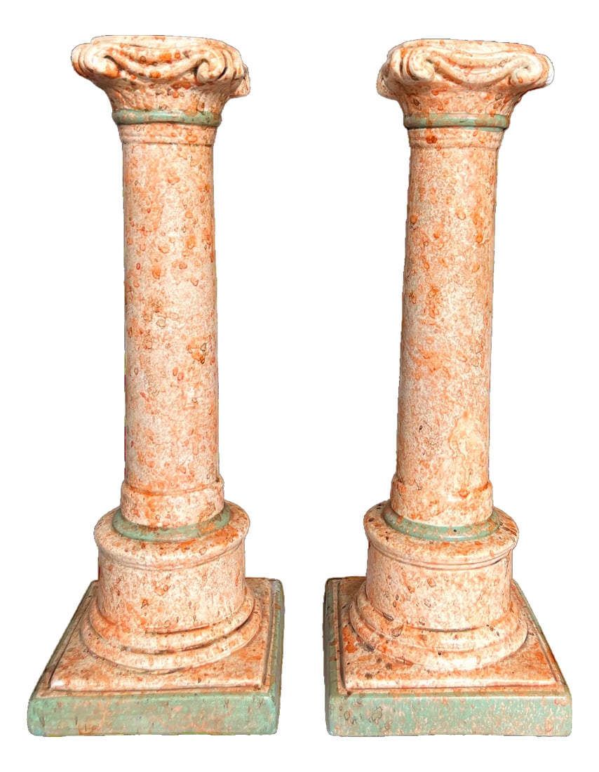 Vintage Italianate Marbleized Terracotta Pink and Green Plaster Candlestick Holders in the Form of C: Pair of hand-painted, plaster candlesticks channels the romance of antiquity in its classical, columnar form, and variegated marbleized finish. Rendered in warm tones of terracotta, sandstone, and