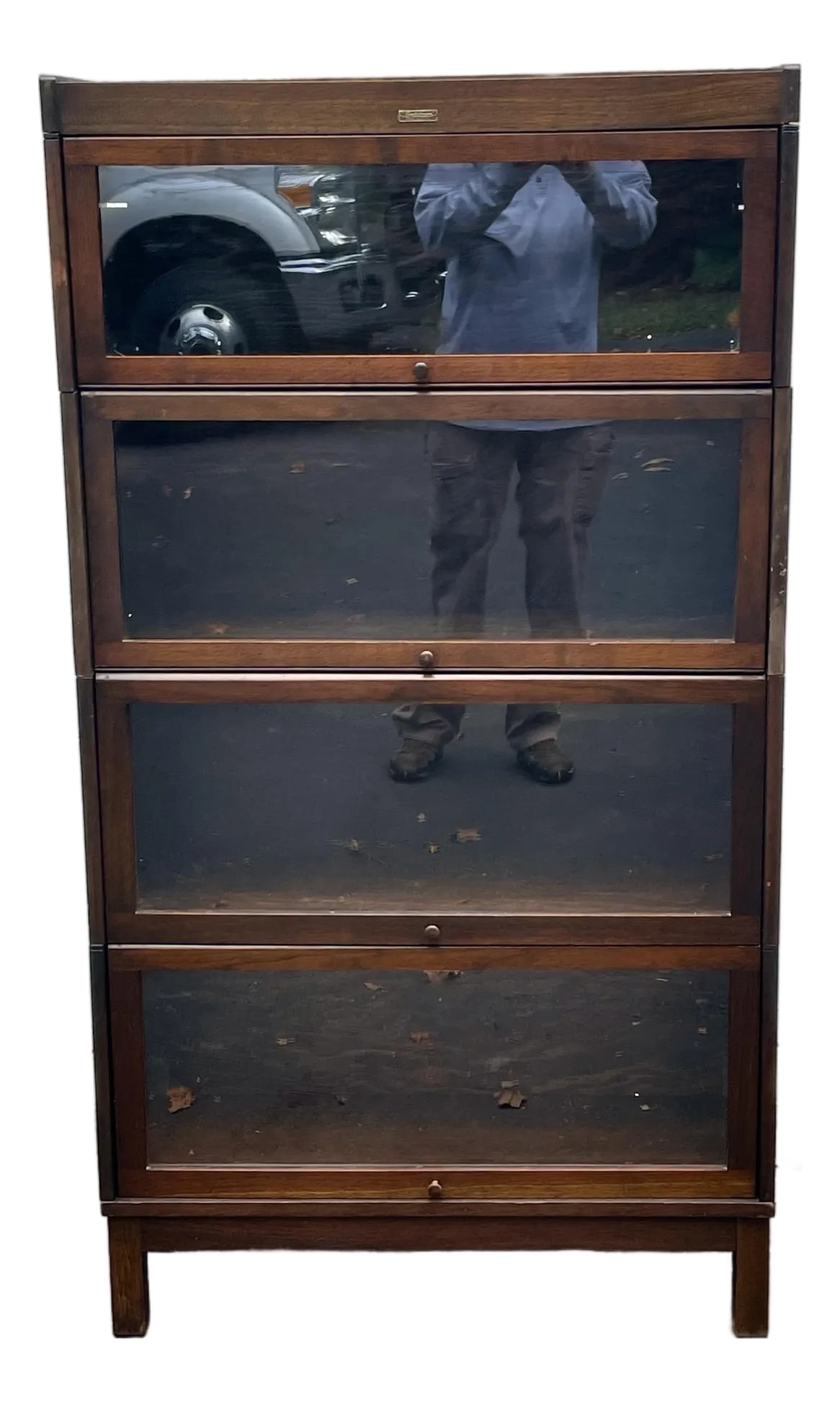 Lundstrom Sectional Barrister Bookcase Early 20th Century: Offered is a four stack bookcase in mission oak. It was manufactured by the C. J. Lundstrom Manufacturing Company. The patent number on the label indicates it was manufactured post 1914. The C.J.