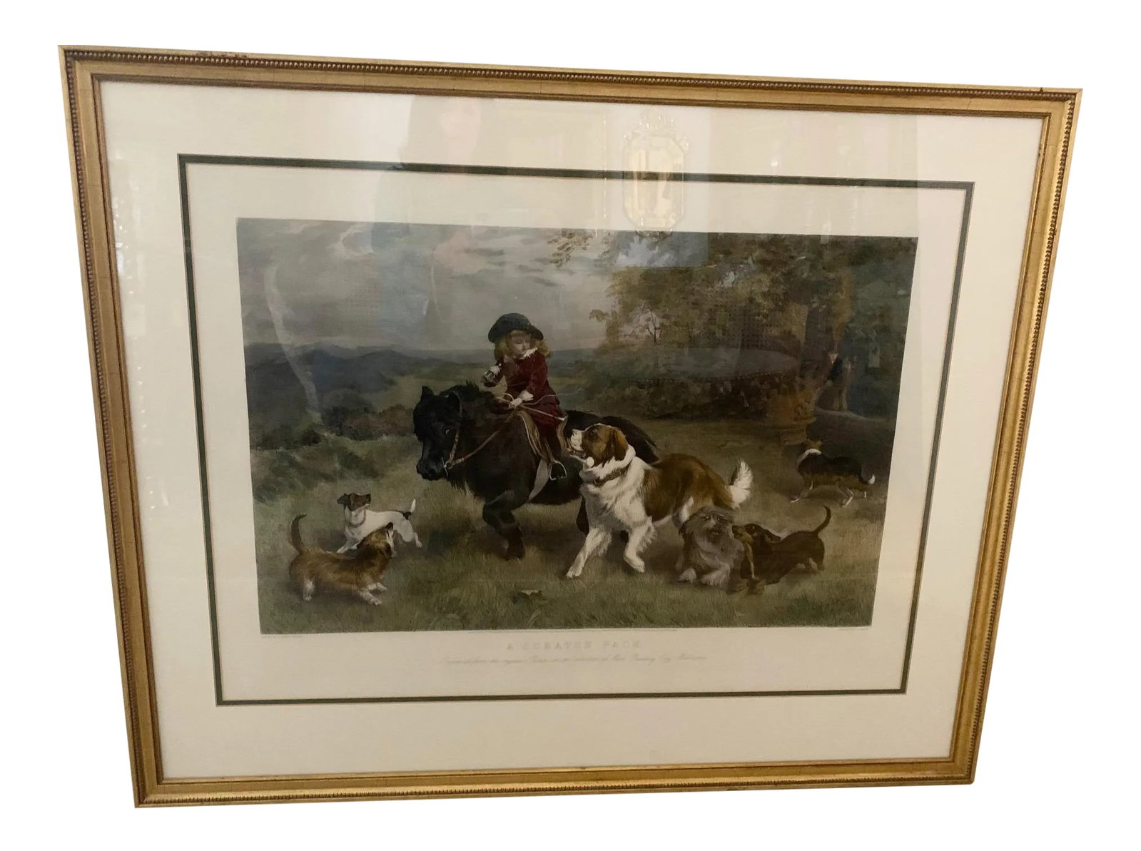 Scratch Pack Etching in Custom Frame: A delightful colored etching of a "scratch pack" group including child on pony and pack of different variety of dogs in a rich landscape. Engraved from the original picture in the collection of Mans