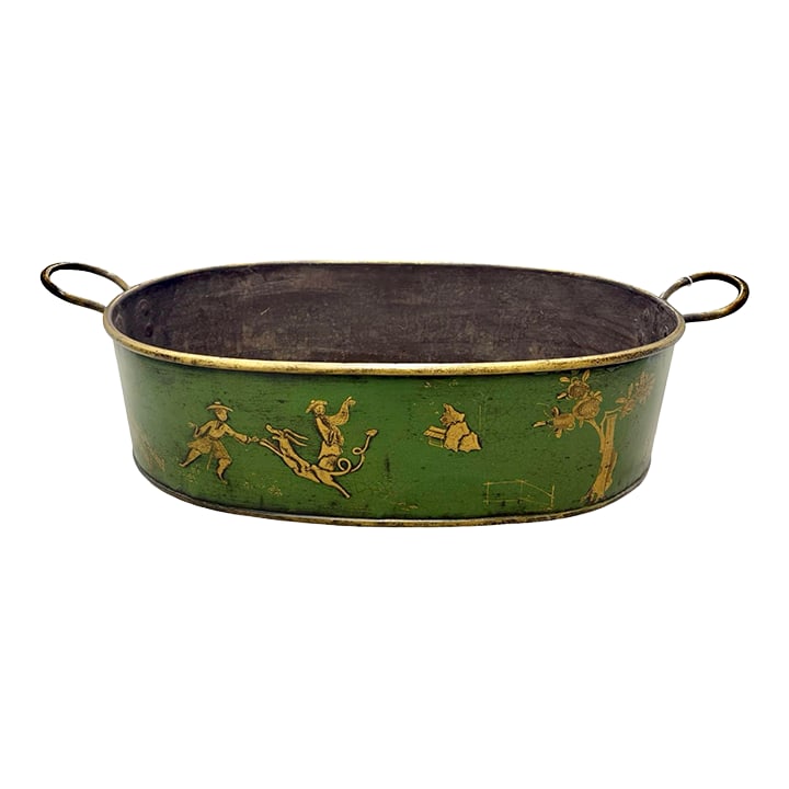 Large Scale Italian Chinoiserie Decorated Tole Jardiniere or Planter: A large-scale Italian tole jardiniere, of oval form, featuring a hand-painted chinoiserie figural landscape on a rich emerald green ground. The continuous panoramic decoration, rendered in gold,