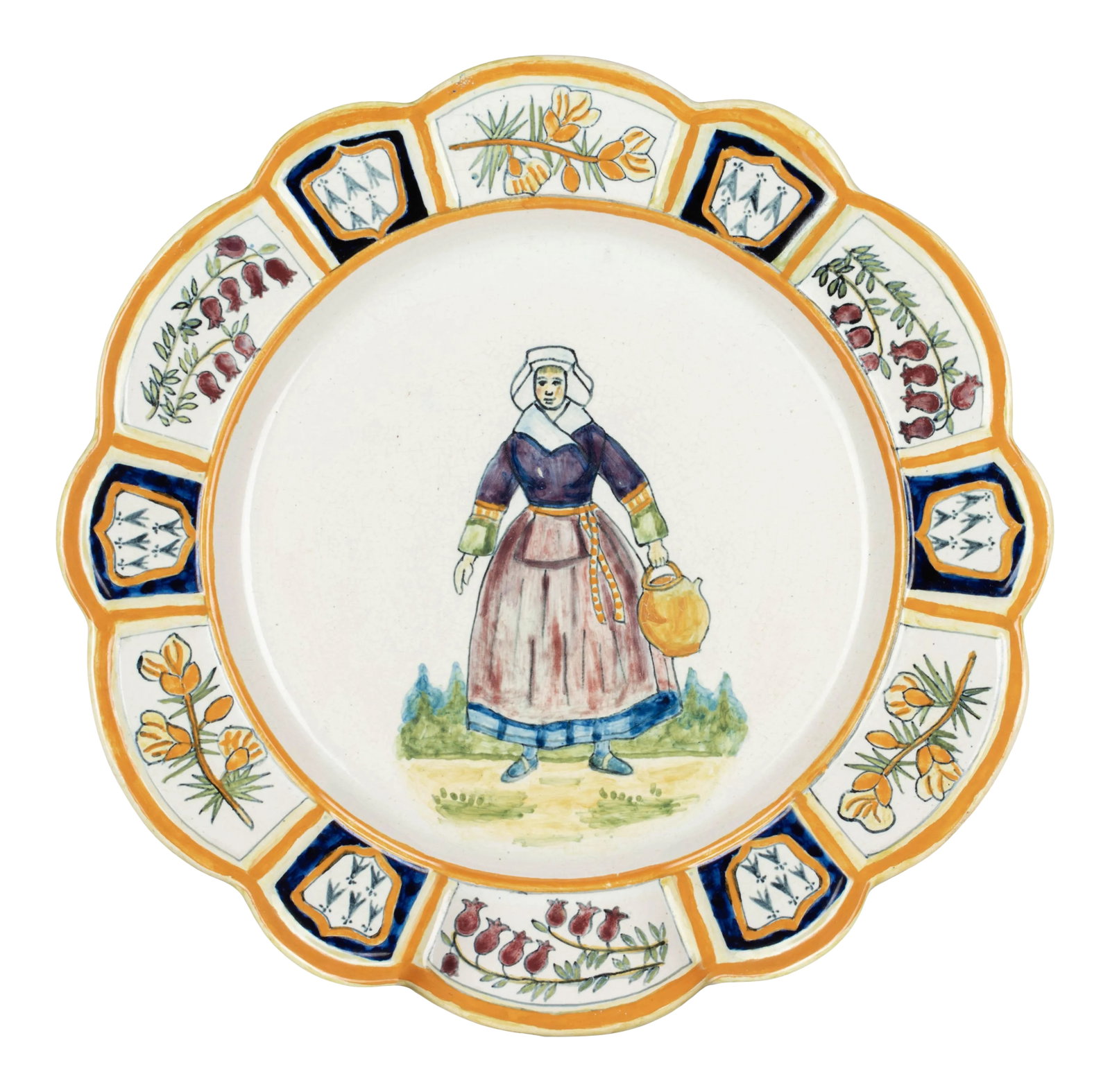 Henriot Quimper Faience Plate: A Henriot Quimper French faience hand painted decorative plate, depicting a woman with water jug. Wide scalloped rim with sectioned border decorated with flowers and the Quimper crest. Nice quality,