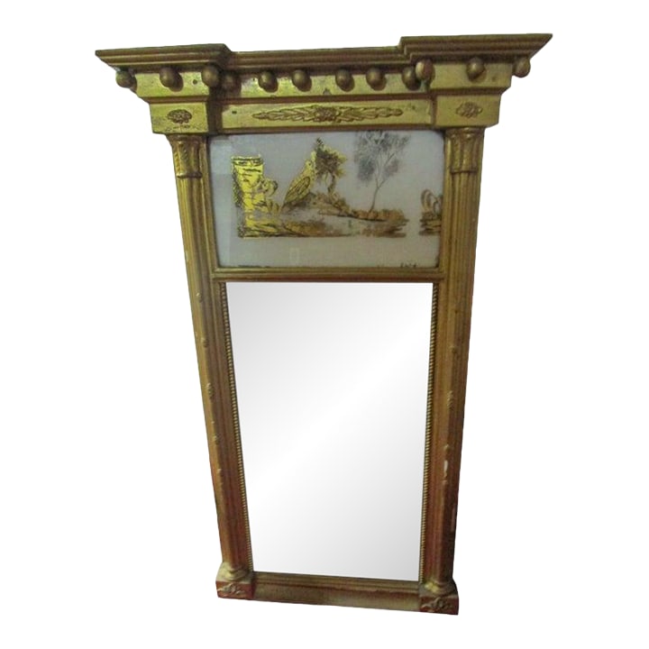 Circa 1820 American Giltwood Mirror With Eglomise Panel Woodland Scene With Bird: Circa 1820 giltwood architectural style looking glass with a reverse painted woodland scene eglomise tablet flanked with reeded columns, beading and appliques. Historian Rodric Blackburn writes that "