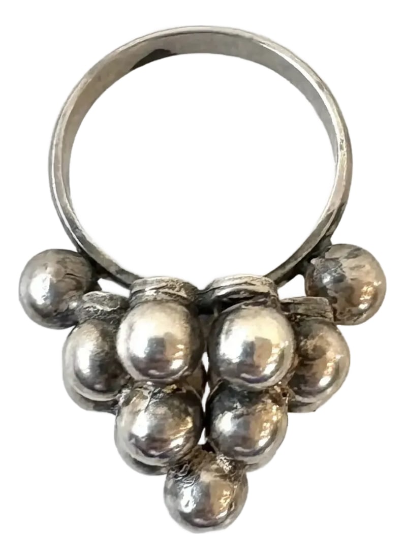 Vintage Mid-Century Sterling Silver Grape Bunch Cocktail Ring - Size 7.75: This fun, textured, mid century sterling silver cocktail ring is shaped like a bunch of grapes piled atop one another. The piled silver beads create height off of the ring's band which creates a bit