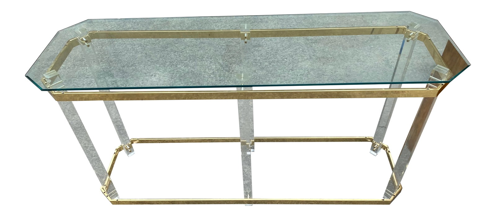 1980s Brass and Lucite Console Table: Beautiful brass and lucite console table with glass top. Perfect addition to any space and for the interior designer. Condition: Alterations: Original Condition Unaltered Imperfections: Some