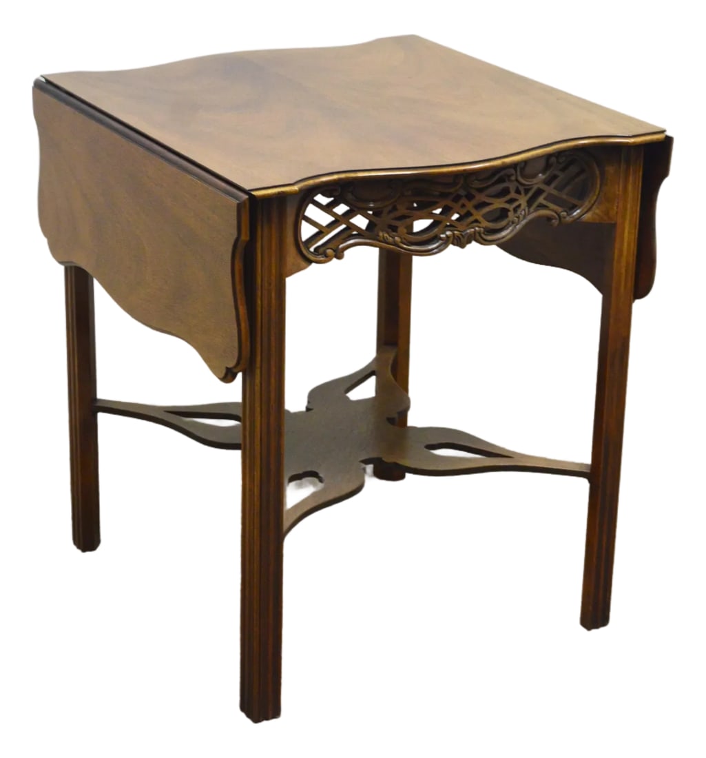 Baker Historic Charleston Side Table: Side Table by Baker. Store item # 526. It features carved wood end extendable (up to 42.5") sides. Condition: Alterations: Original Condition Unaltered Imperfections: Some Imperfections Condition