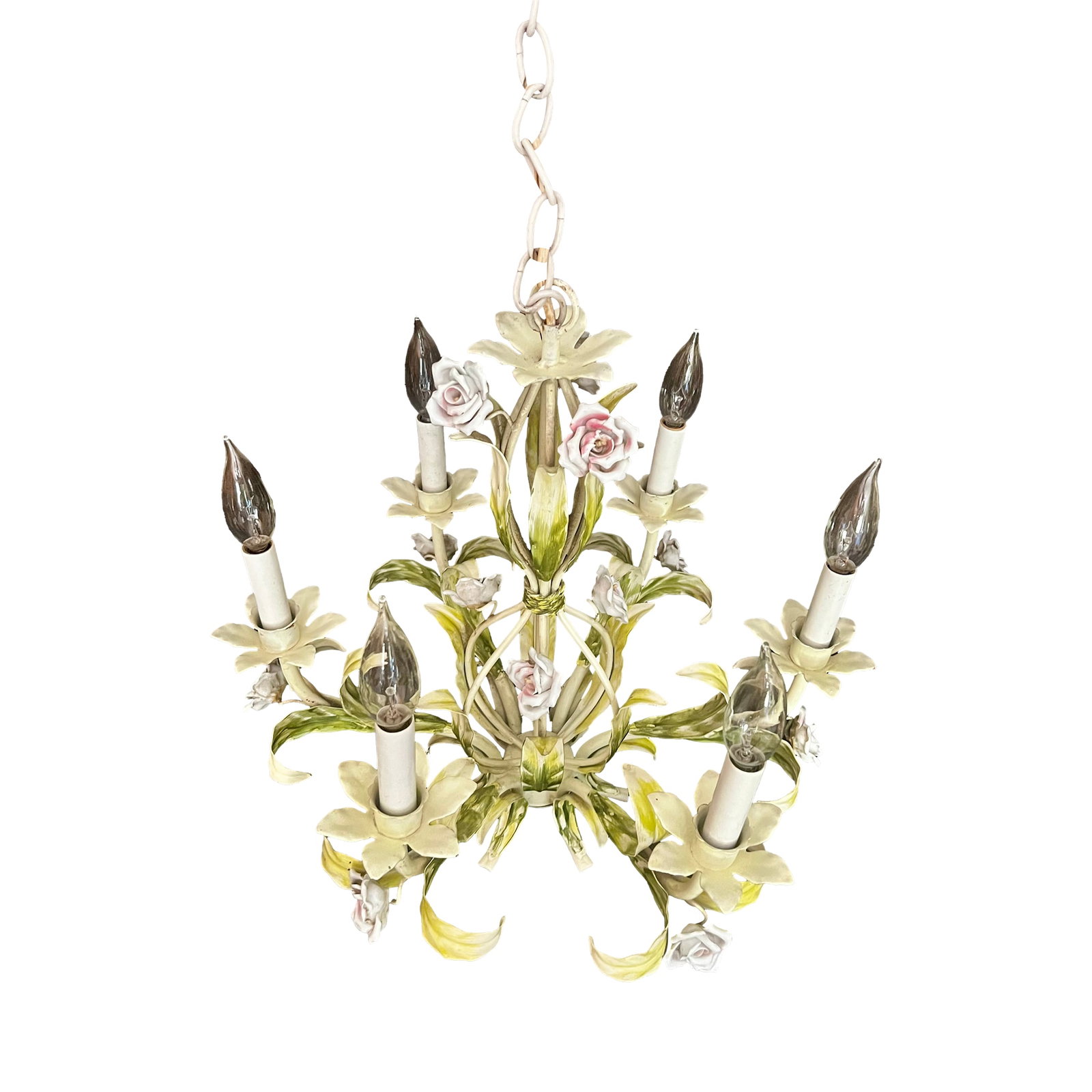Vintage Tole Six-Arm Chandelier With Roses & Leaves: This charming, mid-century tole six-arm chandelier appears to be constructed out of leaves and is decorated with delicate pink roses. Each of the six arms has a faux candle with a candelabra base sock