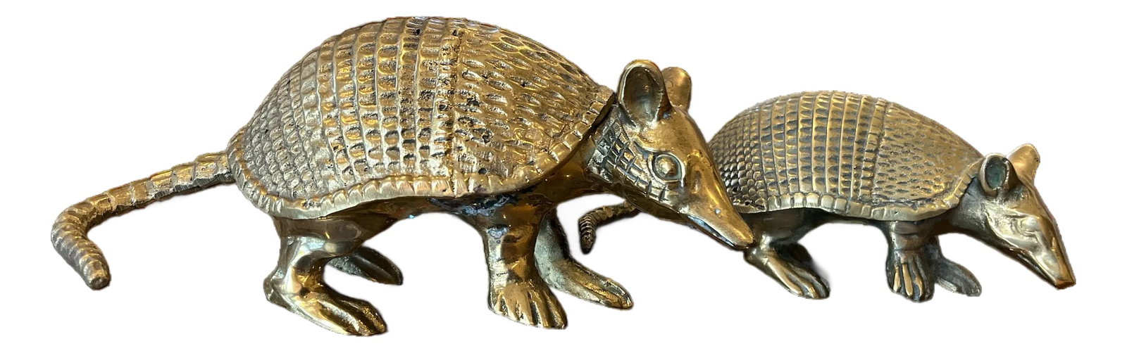 Pair of Vintage Solid Brass Armadillo Sculptures - 1970s Hollywood Regency: Wonderfully whimsical pair of solid brass armadillos, full of texture, Southern charm, and 1970s glamour. Each piece is beautifully cast with detailed segmented armor, elongated snouts, expressive