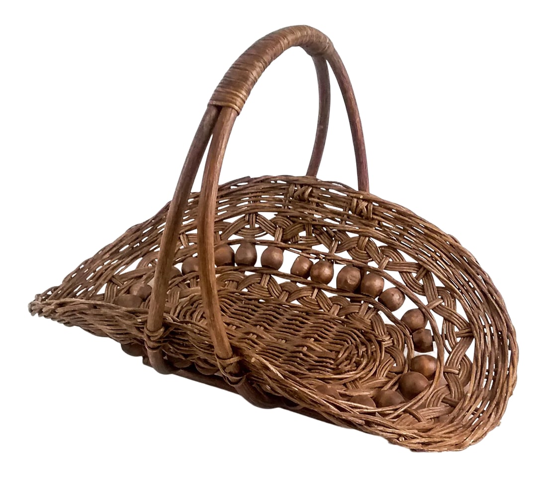 Antique Wicker and Beaded Magazine Mail Basket: Very unique and unusual design for holding your magazines or newspaper. We love the curvy shape and bentwood handles. The coolest detail is in the hand carved wood beads. Super strong and ready to use