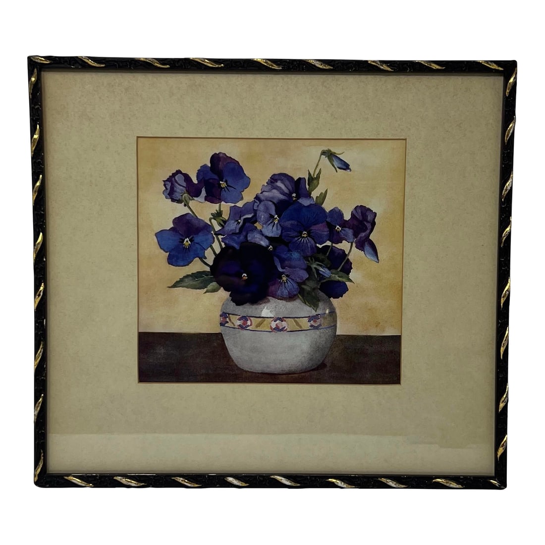 Floral Still Life Print in Period Gilt-Accented Frame, Early 20th Century: This antique floral still life print depicts a bouquet of blue and violet pansies arranged in a ceramic vessel, rendered in a subdued, painterly manner evocative of watercolor techniques. The
