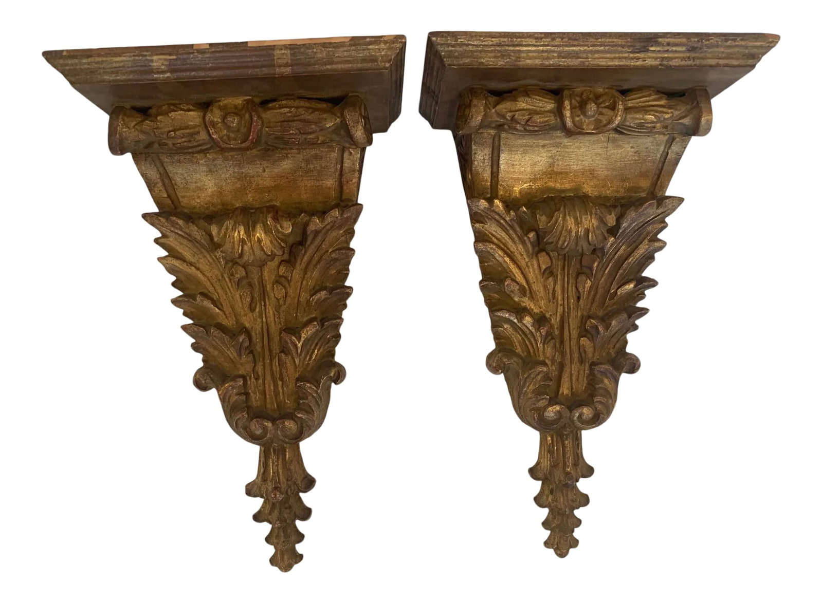 Antique Carved and Gilded French Wall Brackets: Superbly elegant pair of French antique carved and gilded wood wall brackets adorned with acanthus leaves. Condition: Alterations: Original Condition Unaltered Imperfections: Some Imperfections Condit