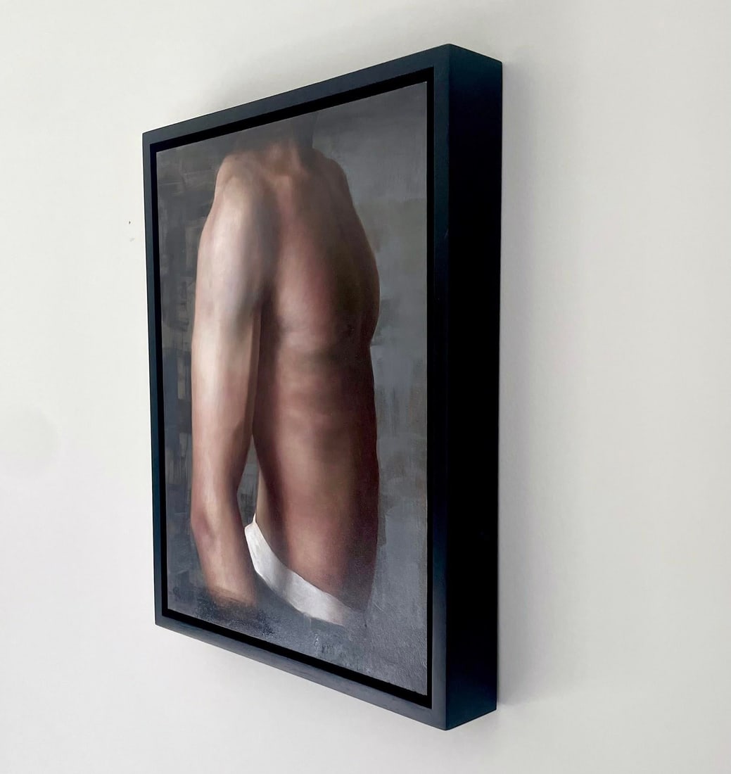 Adam by Kelly Birkenruth | Oil on Panel Portrait of a male figure's torso.: This oil painting presents a close-up view of a male torso, emphasizing the play of light and shadow across the sculpted muscles. The muted background enhances the figure's form, creating an intimate