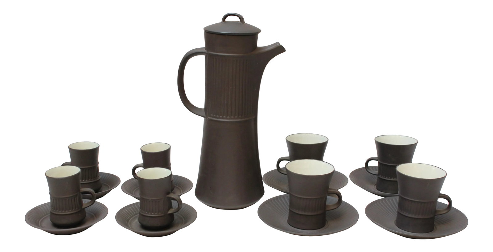 Early Jens Quistgaard for Dansk Flamestone Coffee Pot With Mugs and Demitasses: Denmark 'Flamestone' coffee or tea pot, four demitasses, four mugs, and eight saucers (four small / four larger) by Jens H. Quistgaard for Dansk Designs, circa 1958-1964. Features the Flamestone