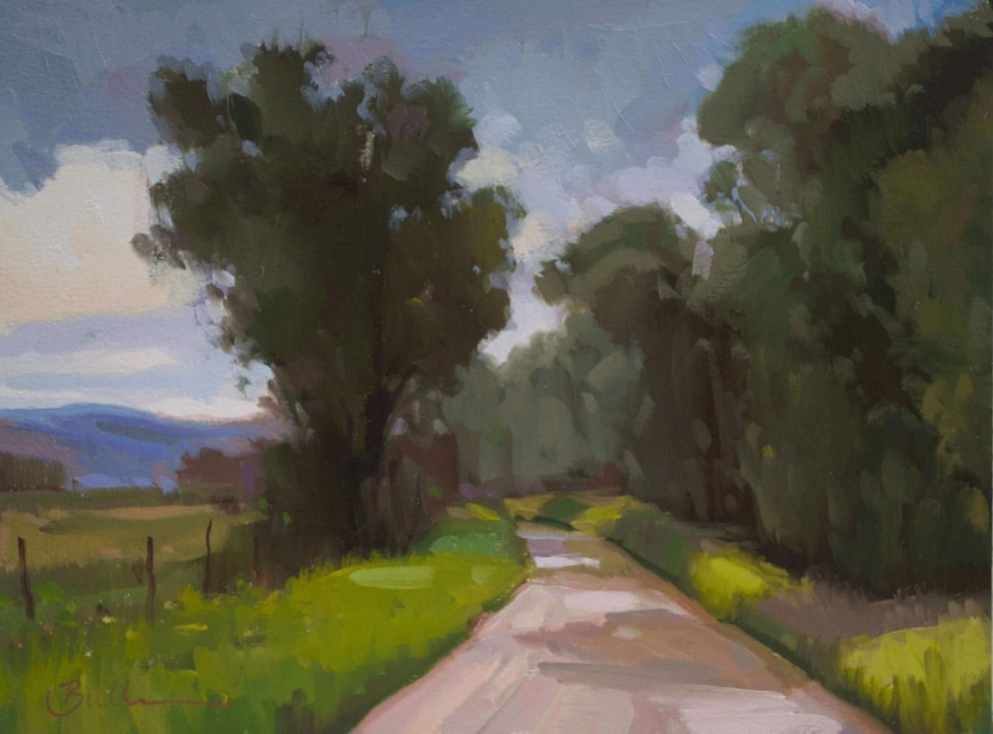 Idaho Road by Samantha Buller | Oil on Arches paper mounted on cradled panel winding rural road scen: Idaho Road, 2025 captures a serene countryside scene, where a winding road meanders through lush greenery and dappled sunlight. The loose brushwork conveys a sense of movement and spontaneity, while