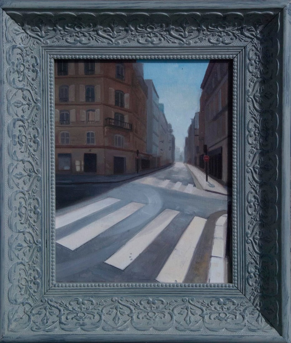 Paris Street 2 by Richard T Scott | Oil on canvas city street with crosswalk and buildings: This oil on canvas piece captures a quiet Parisian street, characterized by its stark, clean lines of the crosswalk leading into the distance. The muted palette and soft light evoke a sense of calm