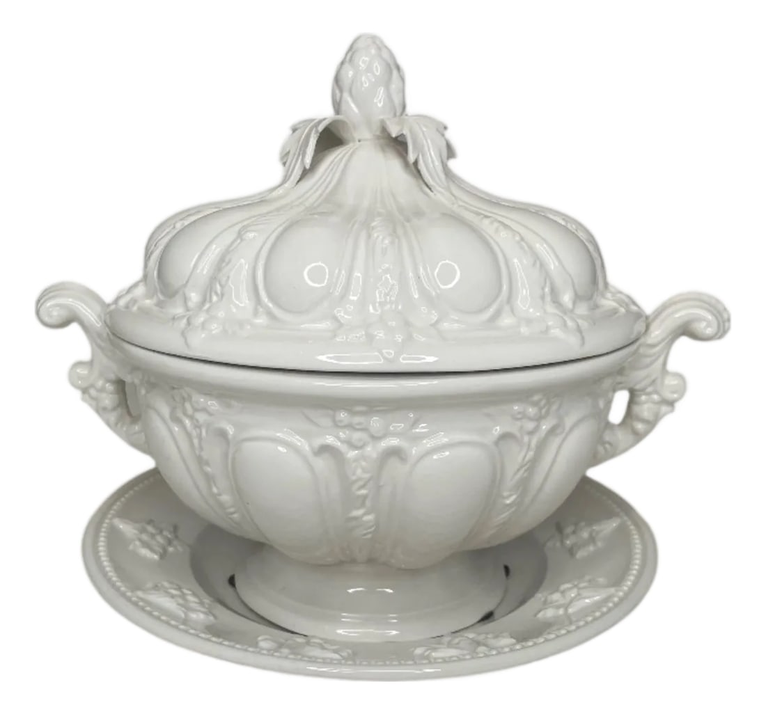 Mottahedeah Sauce Tureen with Artichoke: 9.9" tall 8.6" wide Bring elegance and style to your dining table with our Mottehedeah Sauce Tureen. Made with high-quality materials and a stunning artichoke design, it's perfect for serving and stor