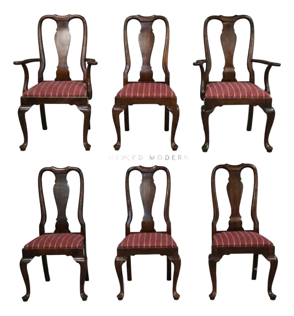 Cherry Dining Chairs by Ethan Allen - Set of 6: A set of six traditional Queen Ann style solid cherry dining chairs made by Ethan Allen. Circa 1980's. Made in USA. Some wear shown. Overall in excellent condition. Seat height is 18". Arms are 25.5" 
