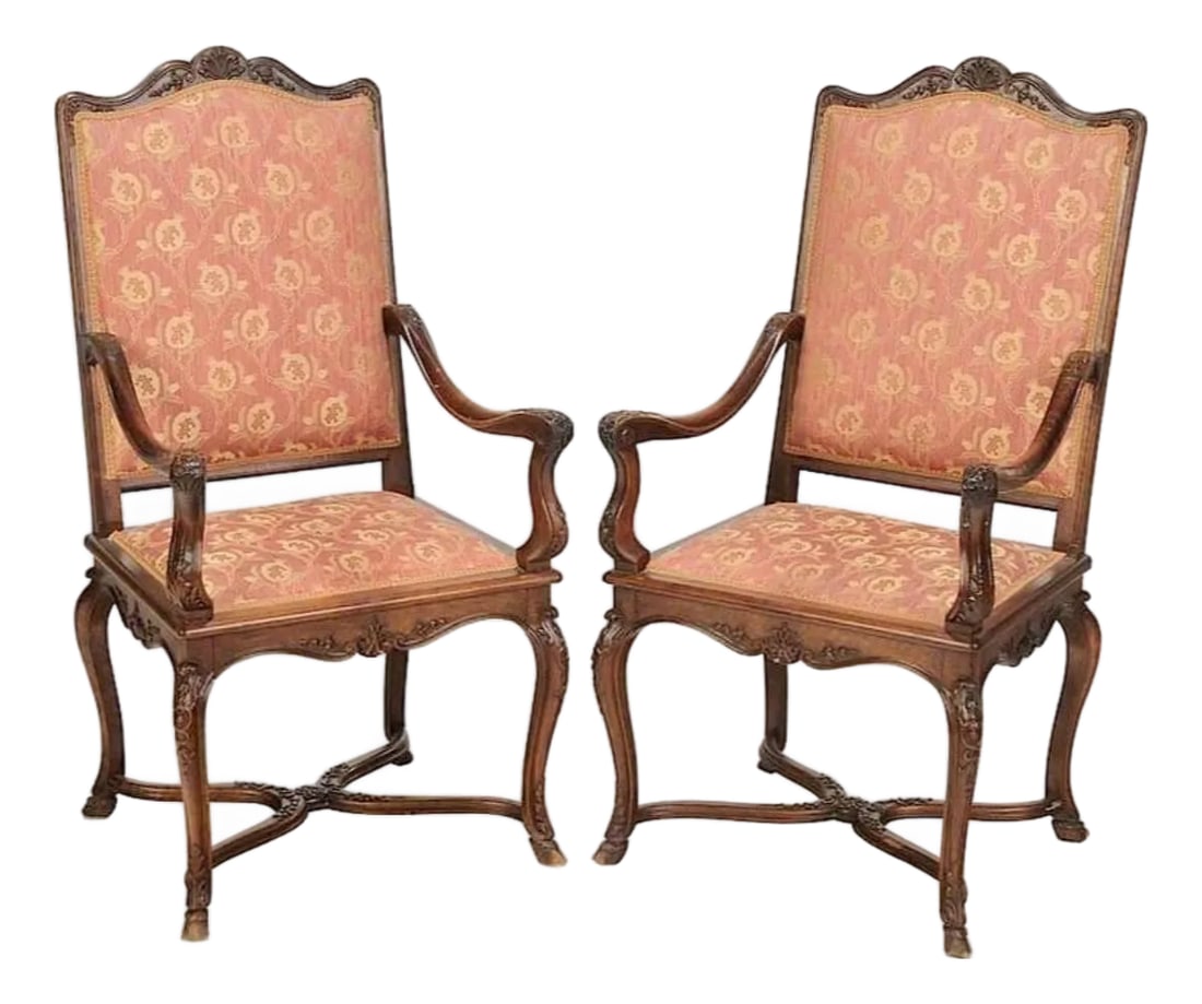 Early 20th Century Pair of Provincial Louis XV Style Chairs: French, early 20th century, well-carved figured walnut frames, stretcher bases and hoof feet, modern upholstery, 45 in. , Provenance: Private Collection, Cashiers, North Carolina Condition: