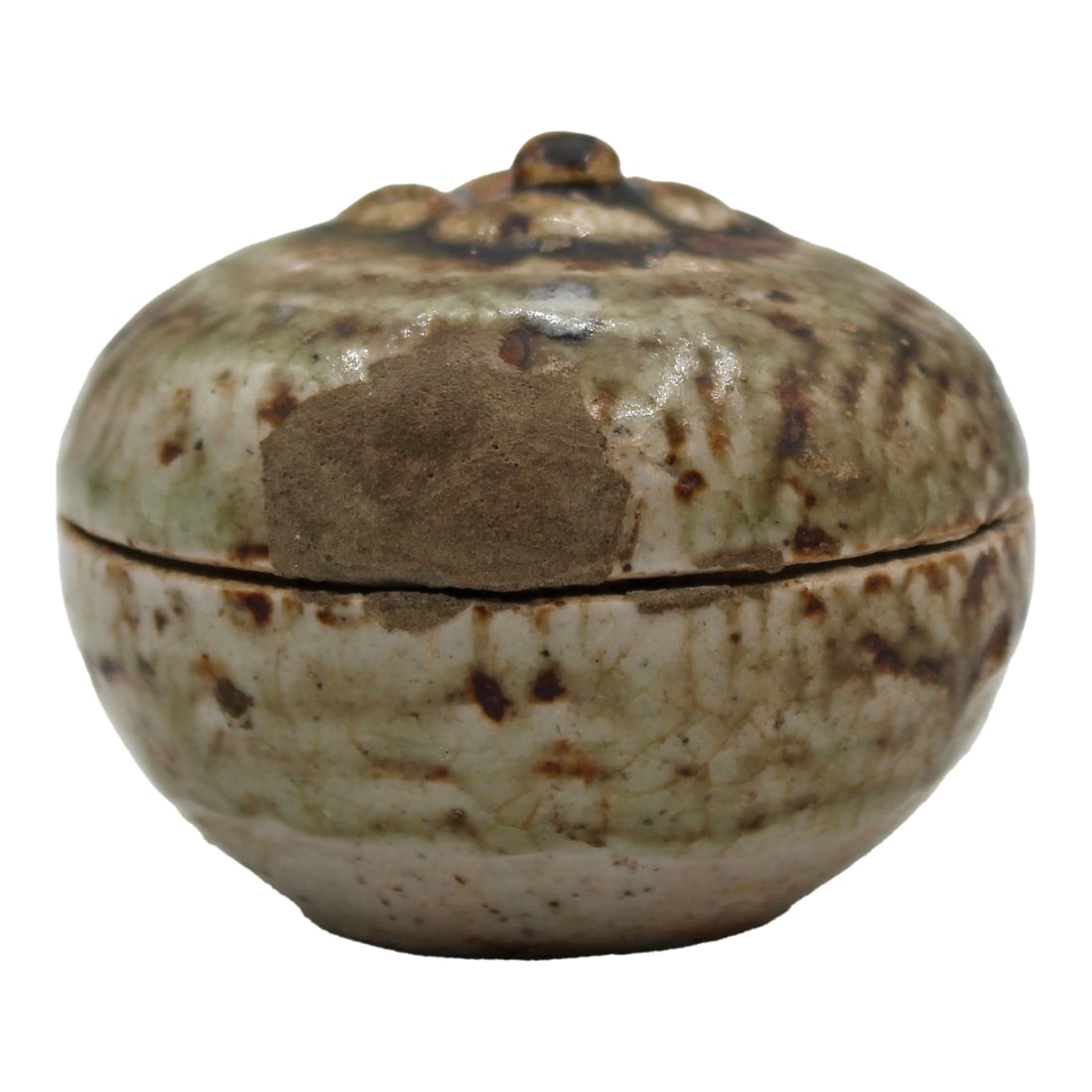 15th Century Thai Sawankhalok Small Stoneware Persimmon Shaped Box: Thai Sawankhalok small stoneware persimmon shaped box, 15th century. Naturalistic body, carved lid & an intriguing repair to the cover which now provides a safety catch inside. Celadon & brown glazes