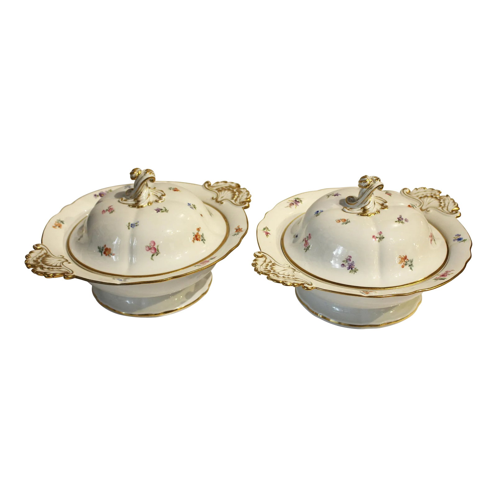 Late 19th Century Meissen Vegetable Tureens - a Pair: Pair of covered vegetable tureens with gilt scalloped edges (minor wear) by Meissen in the scattered flowers or streublumen pattern. Acanthus gilt handles and twist tops. Crossed swords mark.