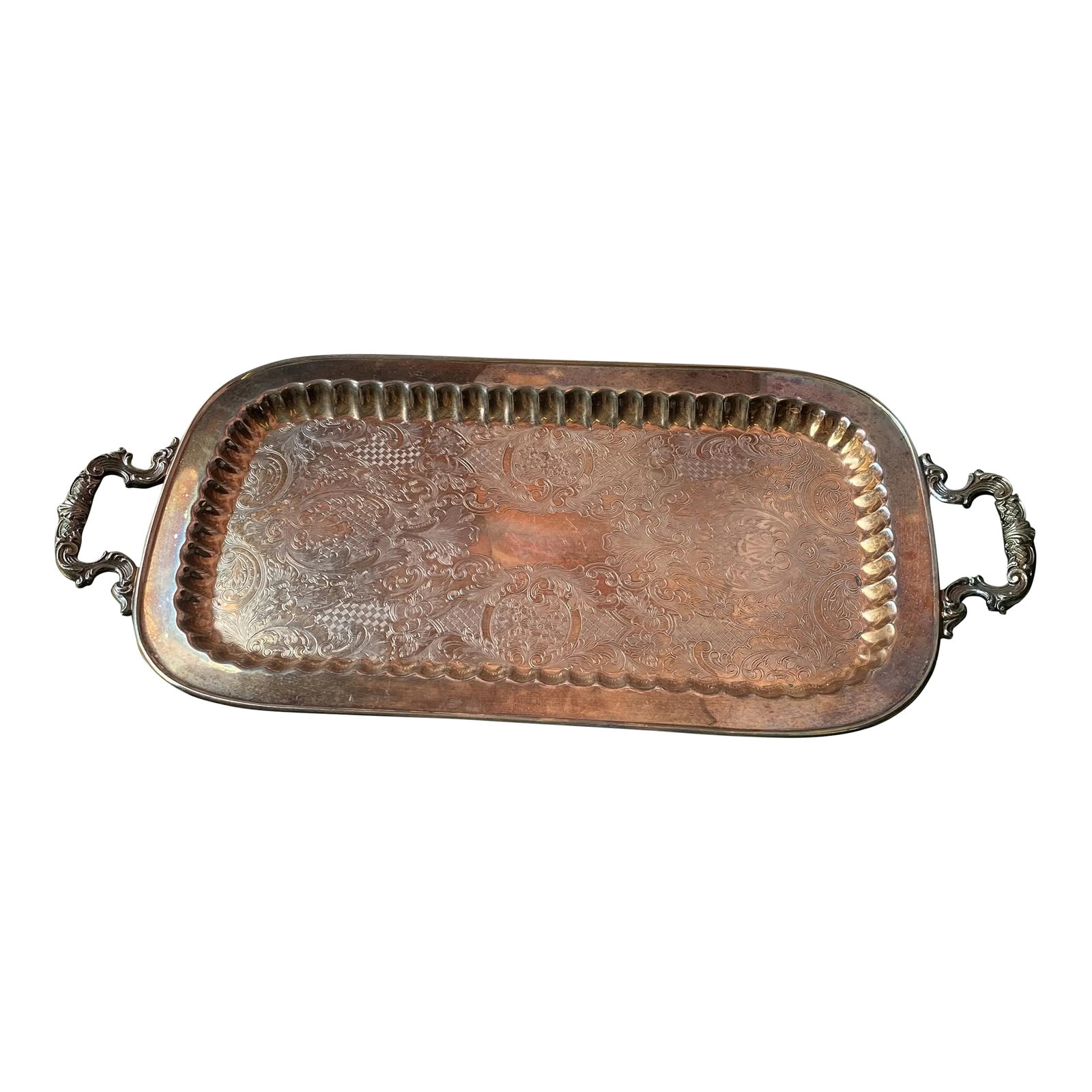 1970s Large Footed Silver Serving Tray With Etchings: A beautiful detailed silver serving tray. Serve up your favorite hors d'oeuvres at your next cocktail party!Perfect for the interior designer or the enthusiast! Condition: Alterations: Original