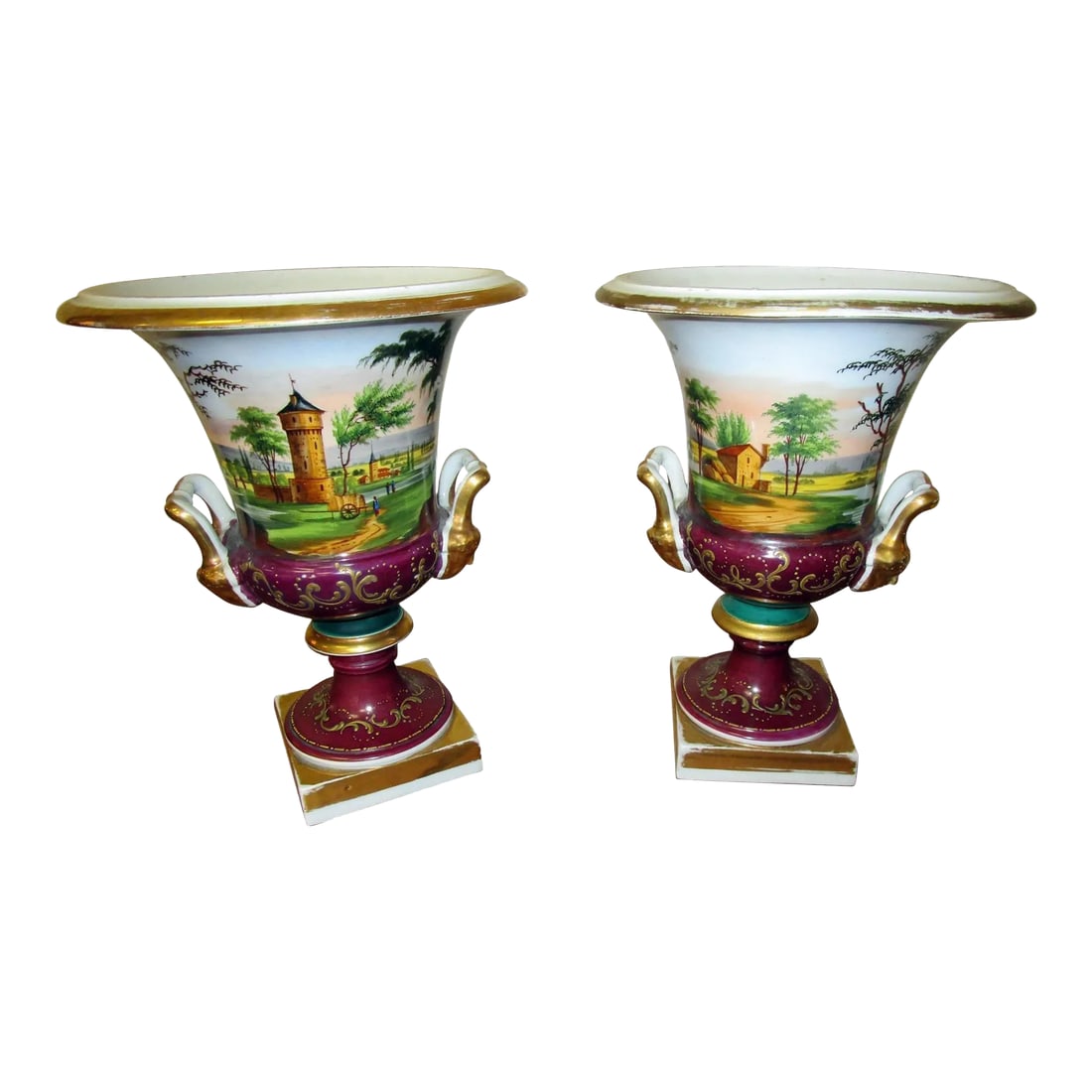 Old Paris Campagna Form Urns - a Pair: Hard paste porcelain with polychrome and gold leaf - iron bolt. Impasto decoration. Lovely colors. These classical form urns are clearly a pair, but not an identical pair. Each has a rustic scene