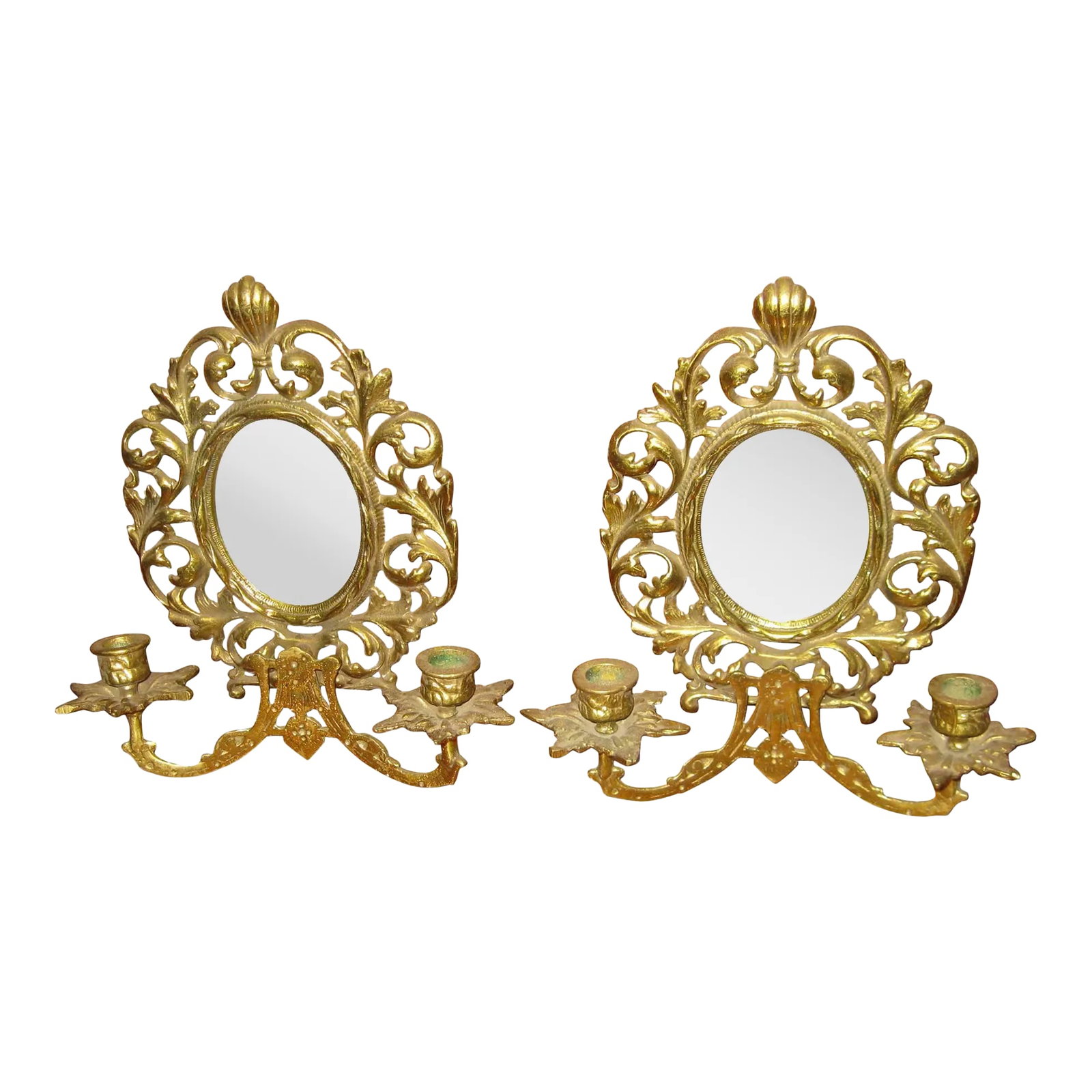 19th century Brass Two Candle Mirrored Wall Sconces - A Pair: Petite pair of two candle mirrored wall sconces from the sumptuous Belle Epoque era. Foliate scrolls with full leaf motif bobeche. Priced as a set. See measurements below. Condition: Alterations: