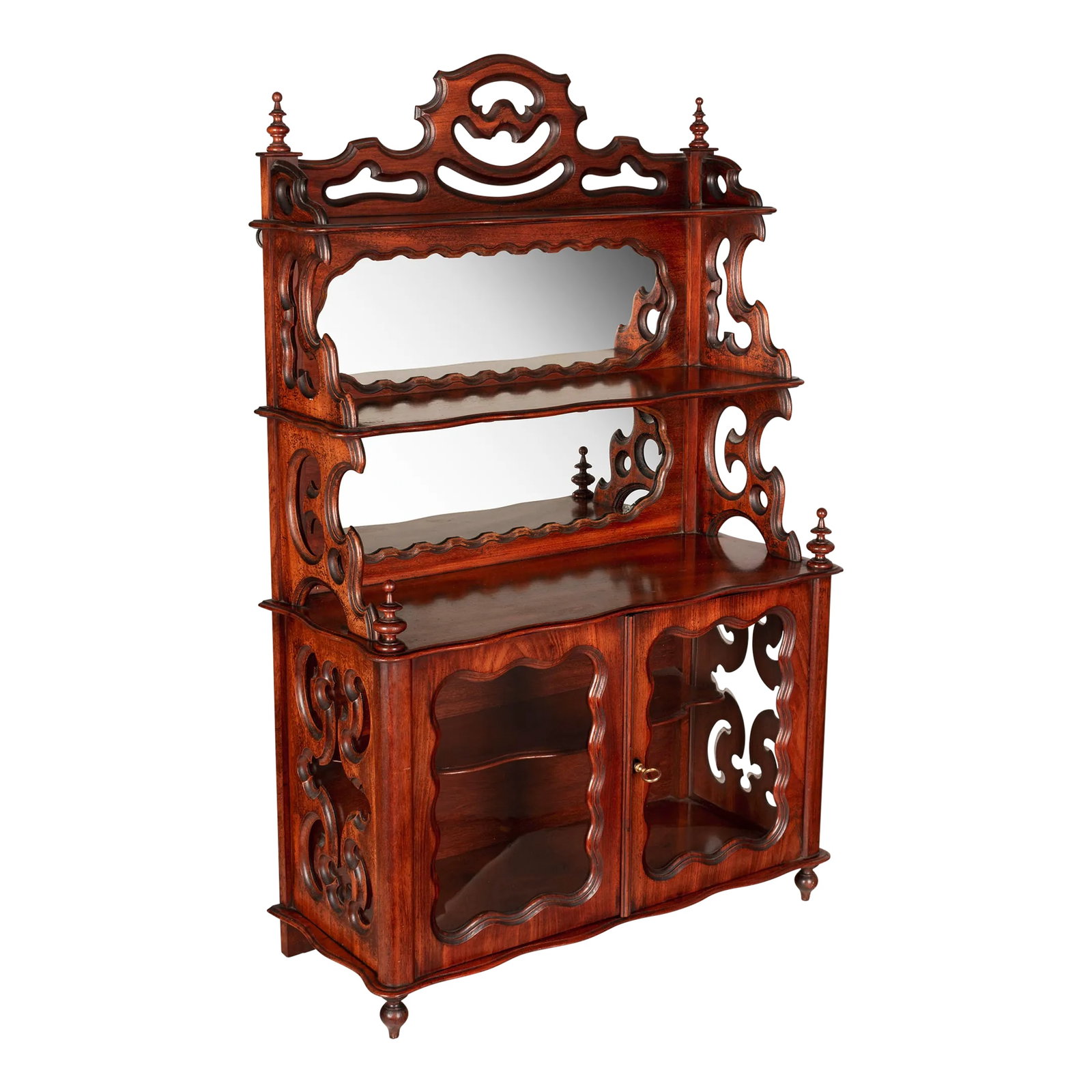 19th Century French Louis Philippe Mahogany Vitrine: A 19th century French Louis Philippe style vitrine or miniature buffet, made of solid mahogany with glass cabinet doors and mirror backed tiered shelves. Glass cabinet door opens to one shelf. Working