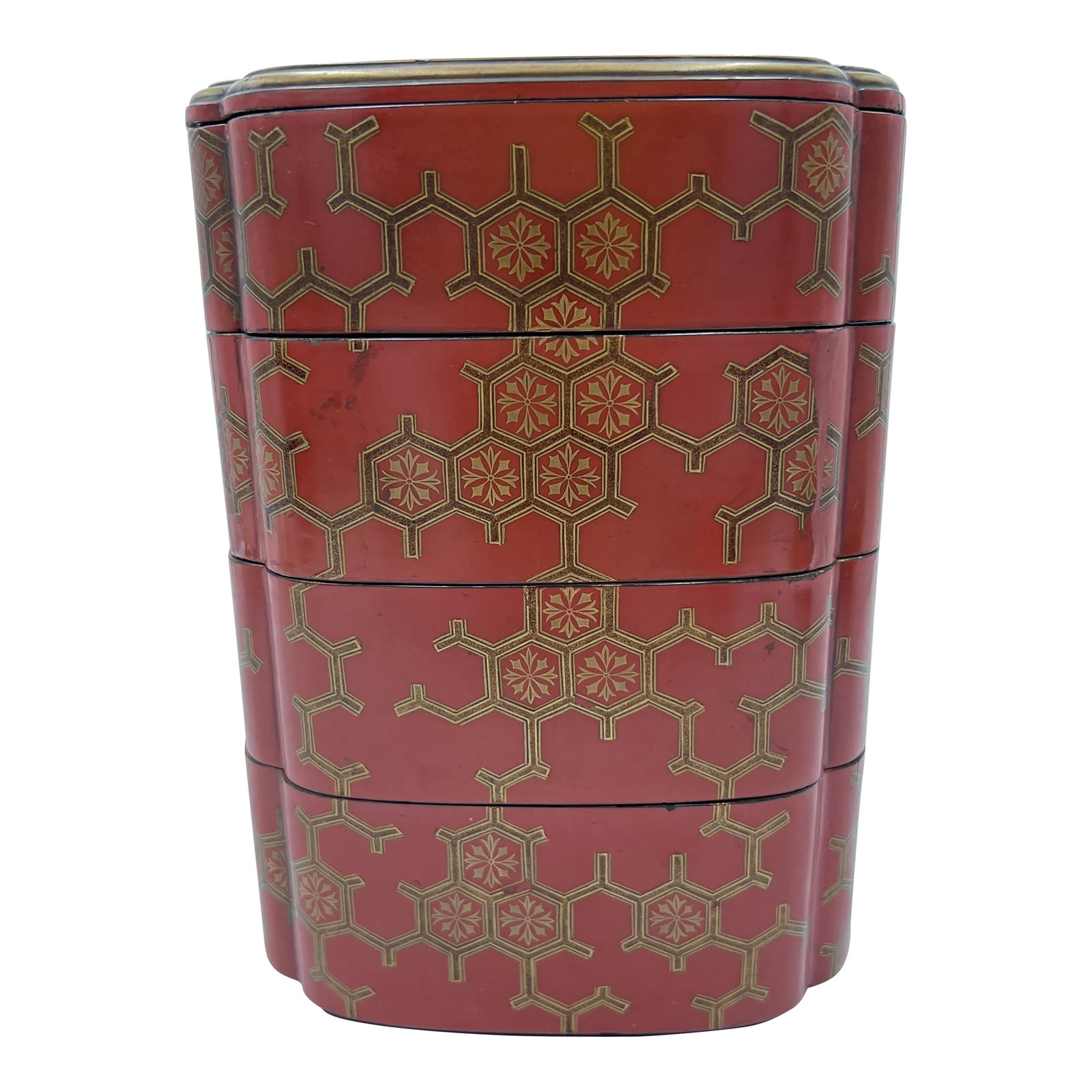 Antique Japanese Jubako 4-Tiered Bento Red Lacquerware Box: An antique Japanese red lacquerware bento box. Constructed in 5 pieces with 4 compartments, each having a gilt border, chromosomal style decoration to body and scalloped corners. Unmarked. Condition: