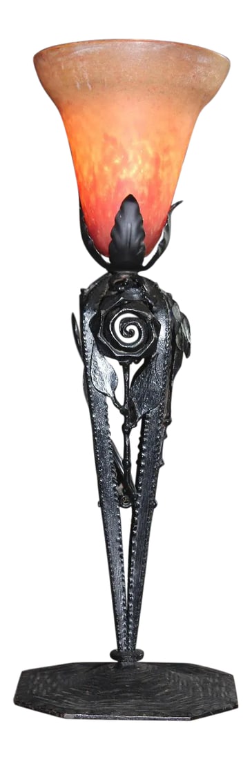 1920s French Art Deco Wrought Iron Lamp With a Glass Shade Signed Daum Nancy: This is an authentic French Art Deco lamp dating to the 1920's. The base was handcrafted from wrought iron and features roses and leaves. The orange glass shade was produced by the famous