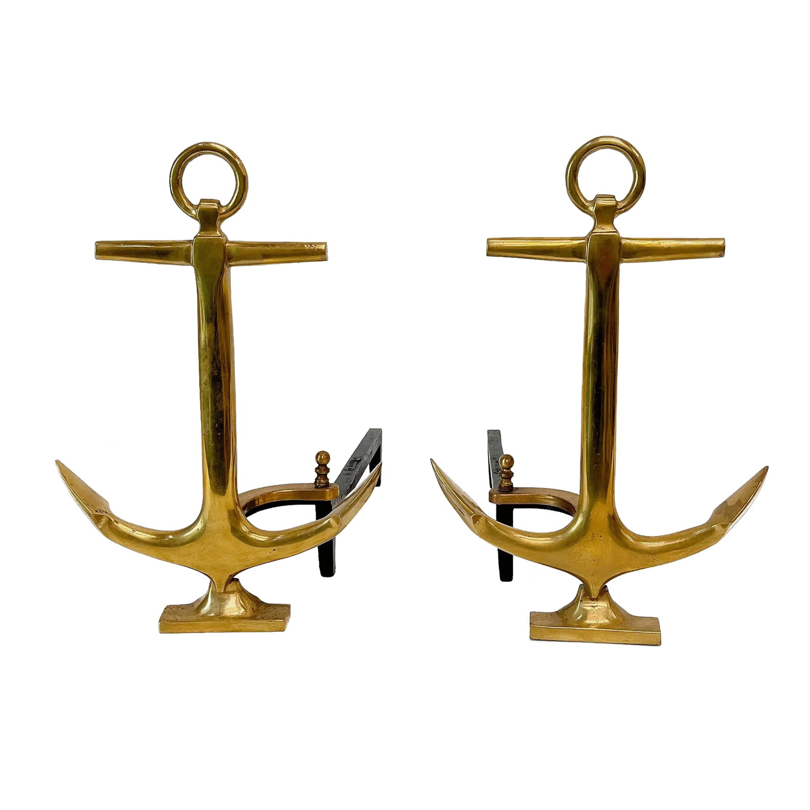 Pair of Vintage Brass Boat Anchor Andirons, Circa 1940s: Pair of anchor-shaped andirons in polished brass with black iron stand by puritan. Made in USA, circa 1940..Perfect for beach house! Condition: Alterations: Original Condition Unaltered