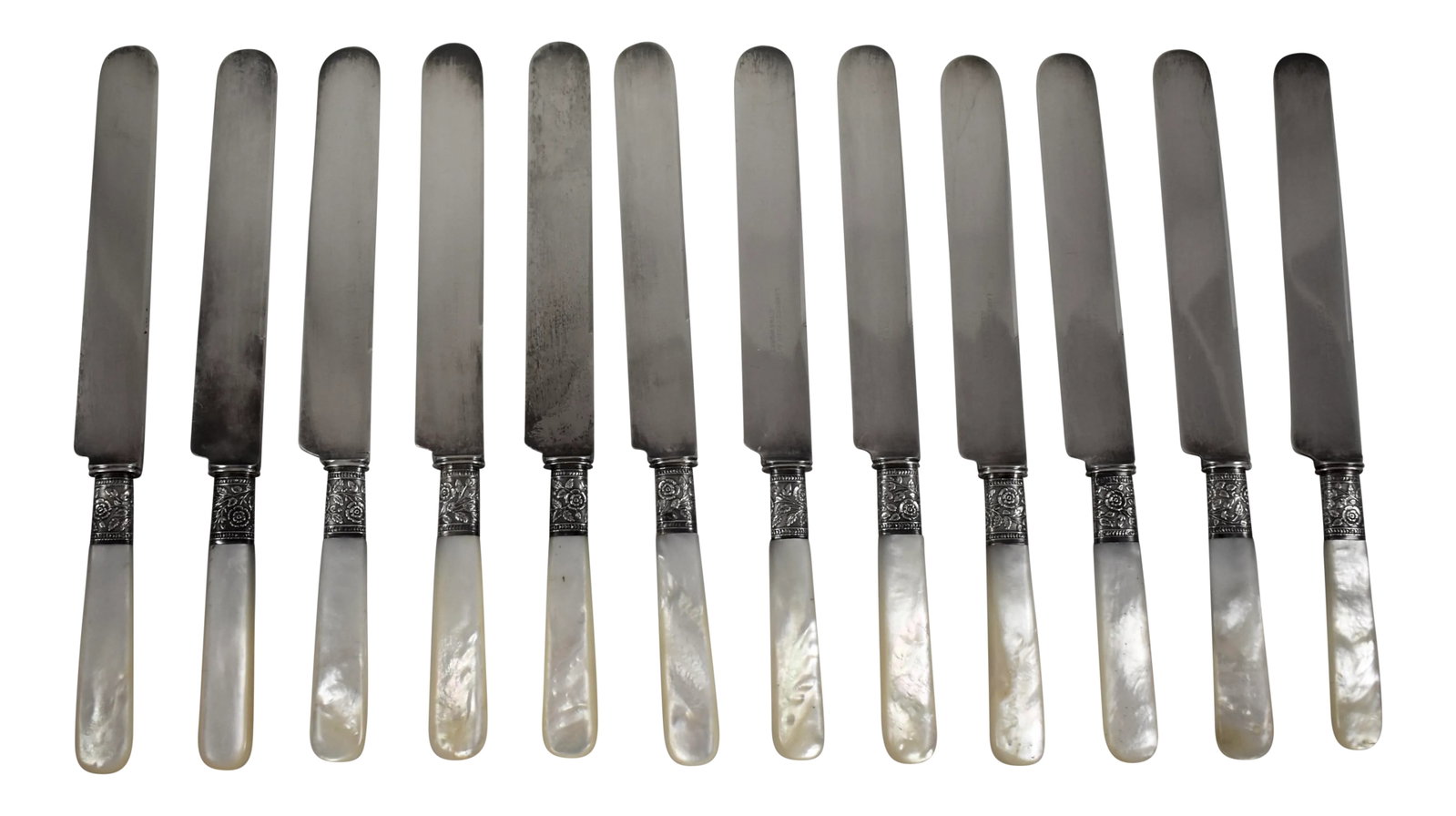 Aetna Works Mother-Of-Pearl Handled & Sterling Silver Place Knives, S/12: From Landers, Frary & Clark, Aetna Works, Founded In New Britain, Connecticut - circa 1866 A Set Of Twelve Mother-Of-Pearl Handled Place Knives With Floral Sterling Silver Ferrules. Blades Are Plated