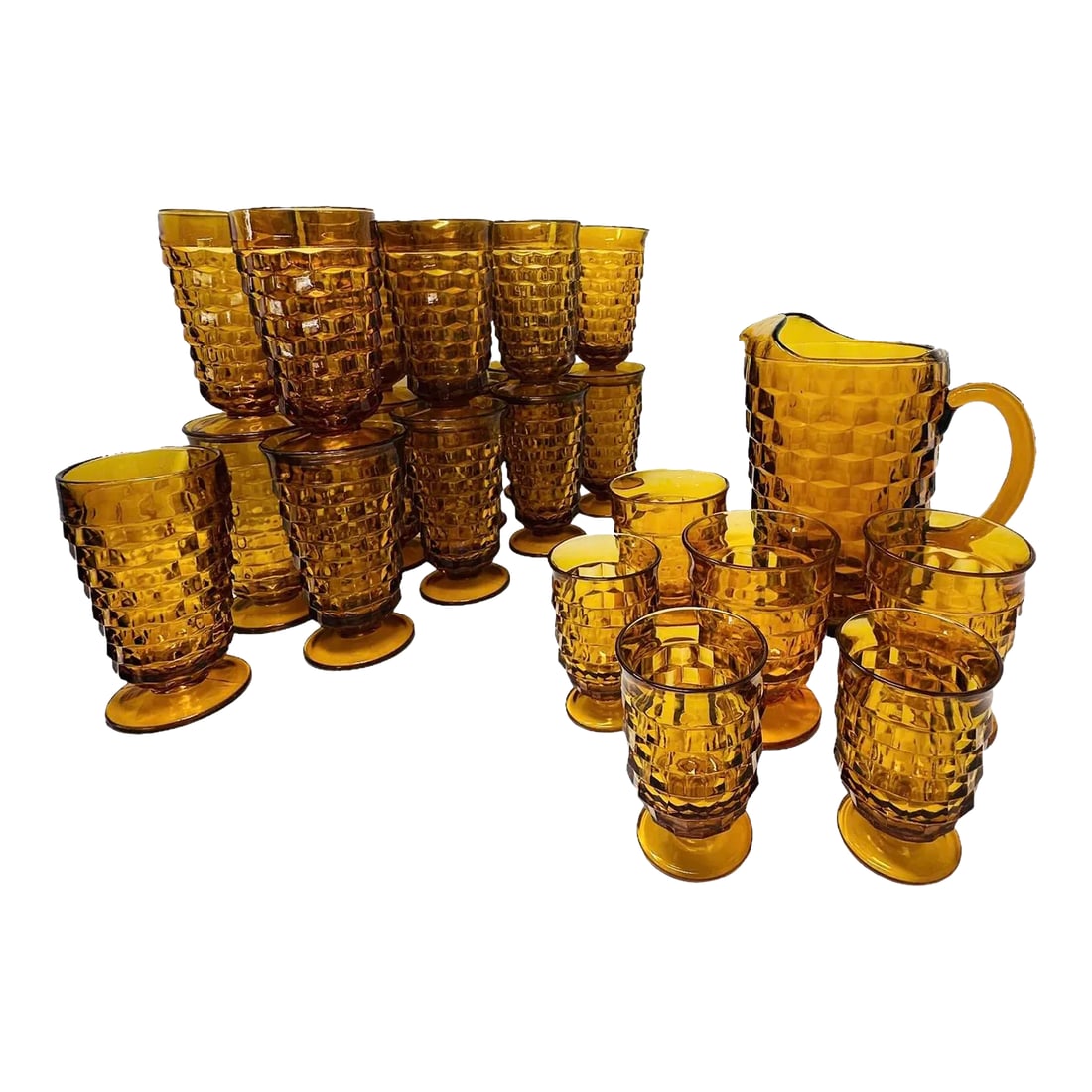 Vintage 24 Piece Collection Indiana Glass Whitehall Amber: Experience the enduring allure of mid-century design with this captivating Vintage 24 Piece Collection of Indiana Glass Whitehall Amber glassware. This extensive collection includes a variety of