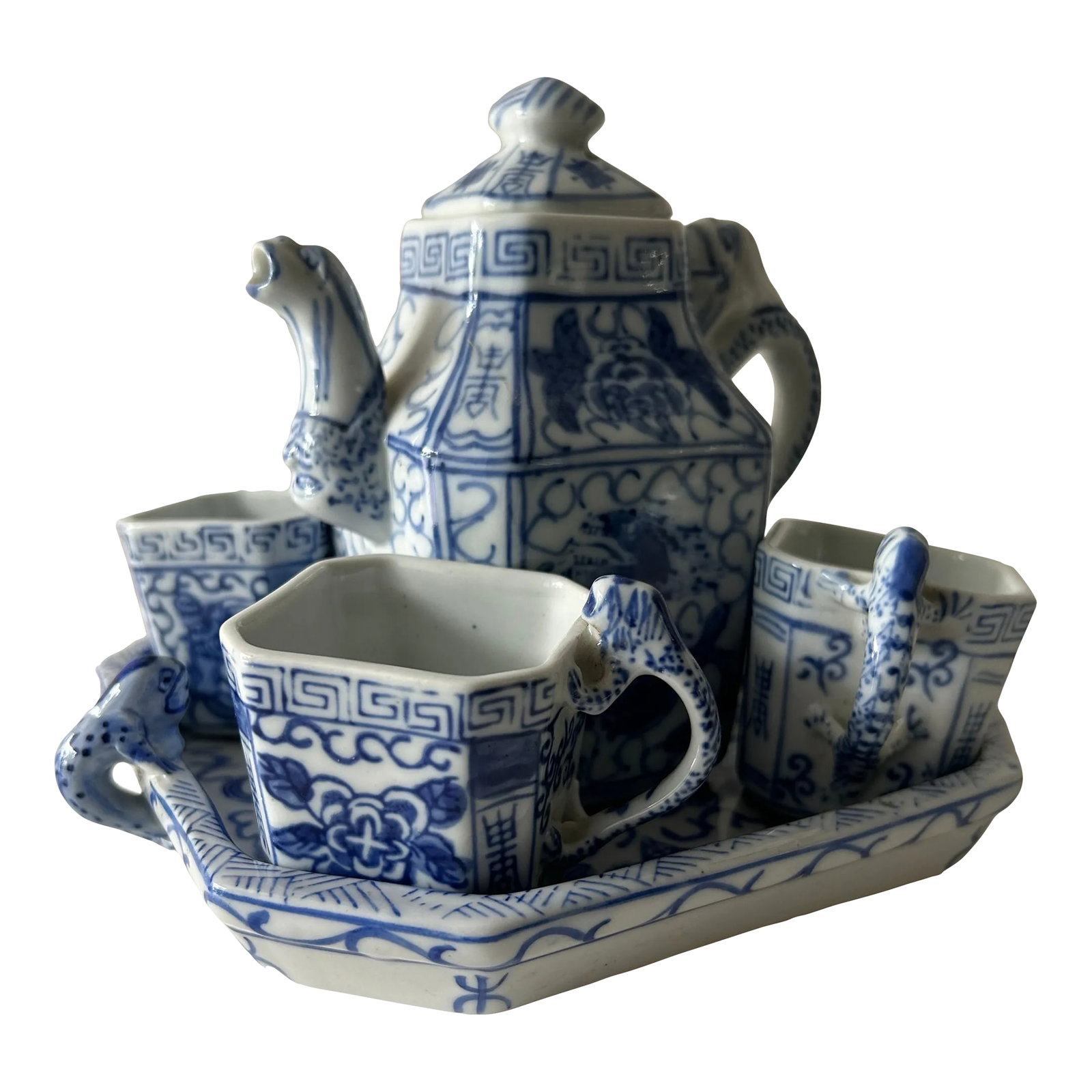 Vintage Porcelain Blue and White Chinese Dragon Tea Set- 6 Pieces: Lovely, charming little blue & white dragon tea set. Each piece features fanciful dragon handles, and the teapot also has a dragon spout. It's a delightful set, and wonderful for your tabletop, tea
