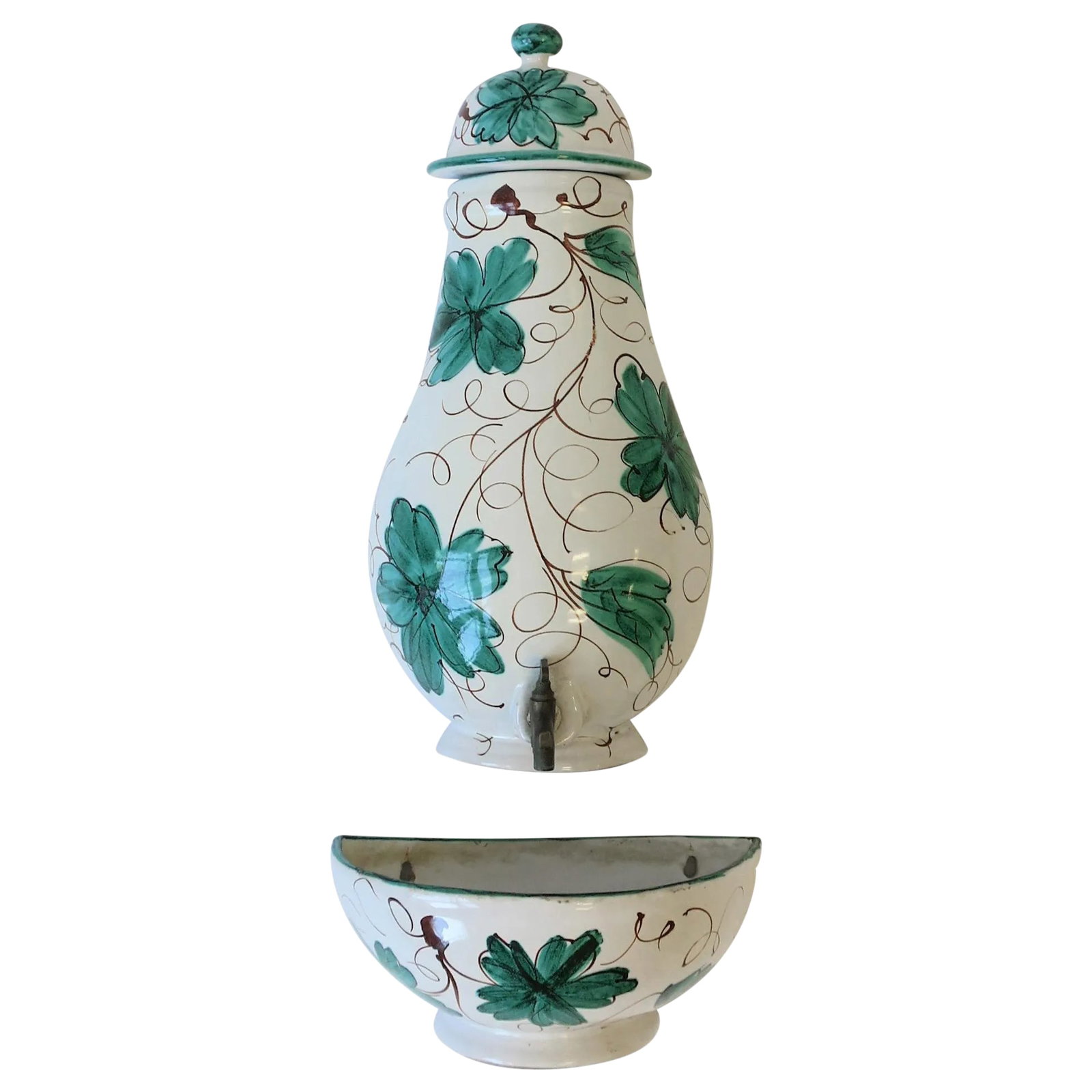 Italian Terracotta Ceramic Wall Fountain: A beautiful hand painted Italian terracotta ceramic and brass wall fountain, circa 20th century, Italy. Piece can hold and dispense water, or another beverage such as tea, lemonade, etc. Fountain