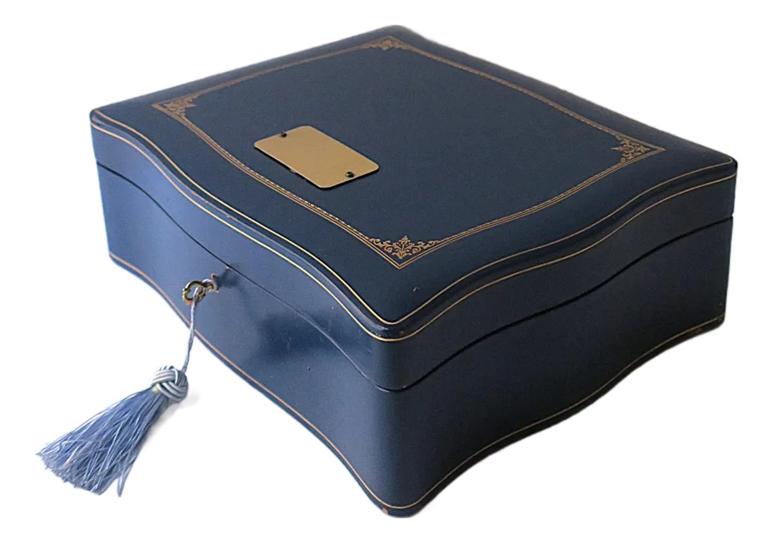 Italian Leather Jewelry Box With Tray, Large: An Italian blue and gold leather jewelry box with removable tray and key/lock, circa mid-20th century, Italy. Leather box is blue leather with decorative edge, gold embossed tooling on top, edge, base